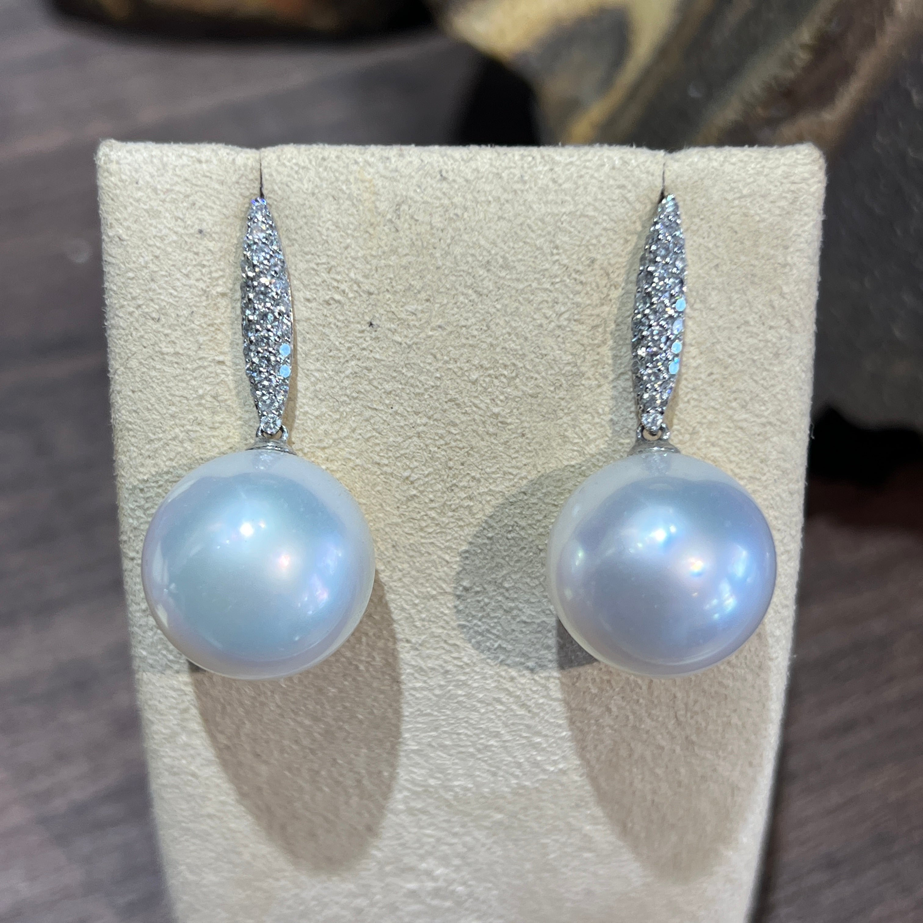 Pair of 18kt white gold drop earrings with 15-16mm white South Sea pearls and pave diamonds