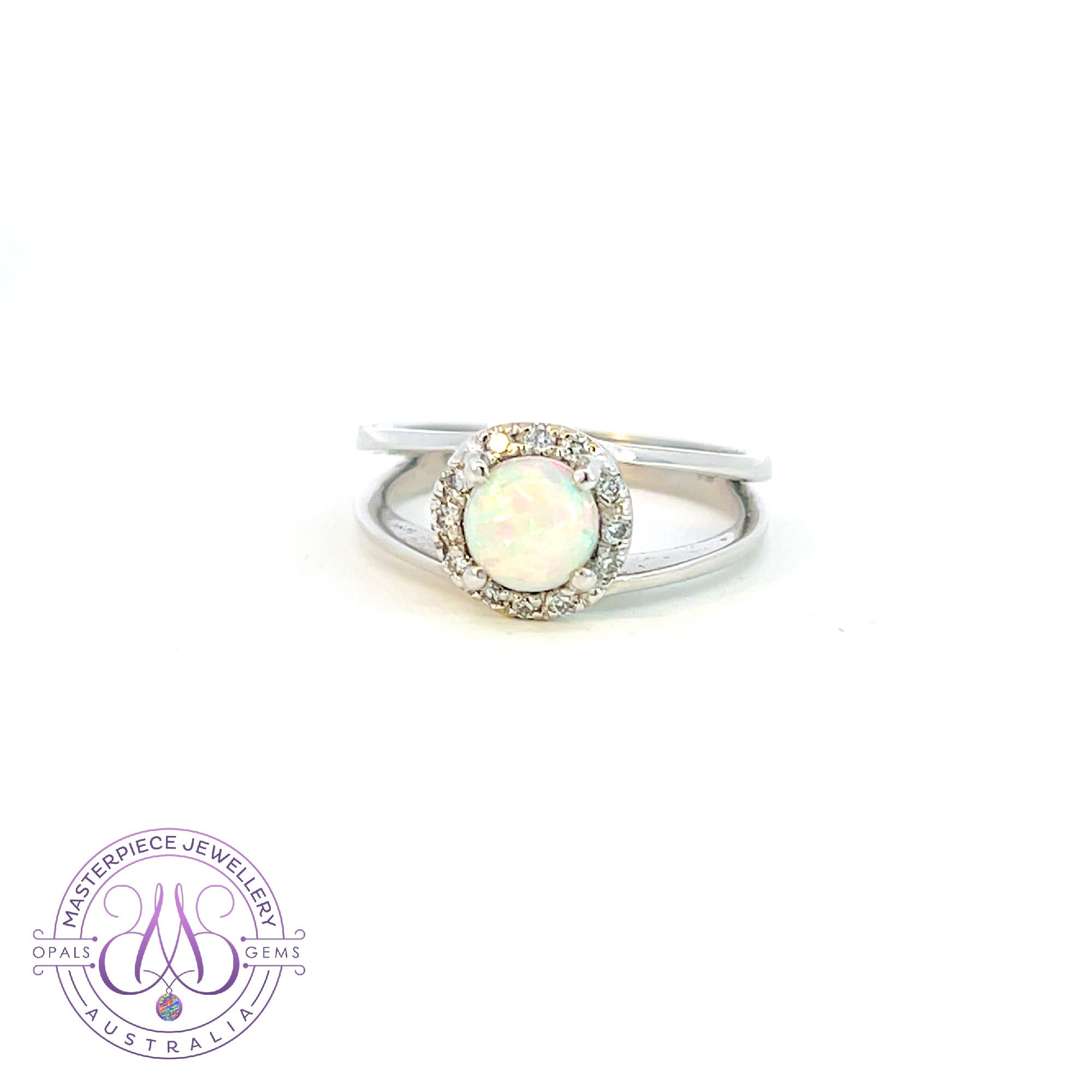 18kt White Gold split shank Opal and diamond ring