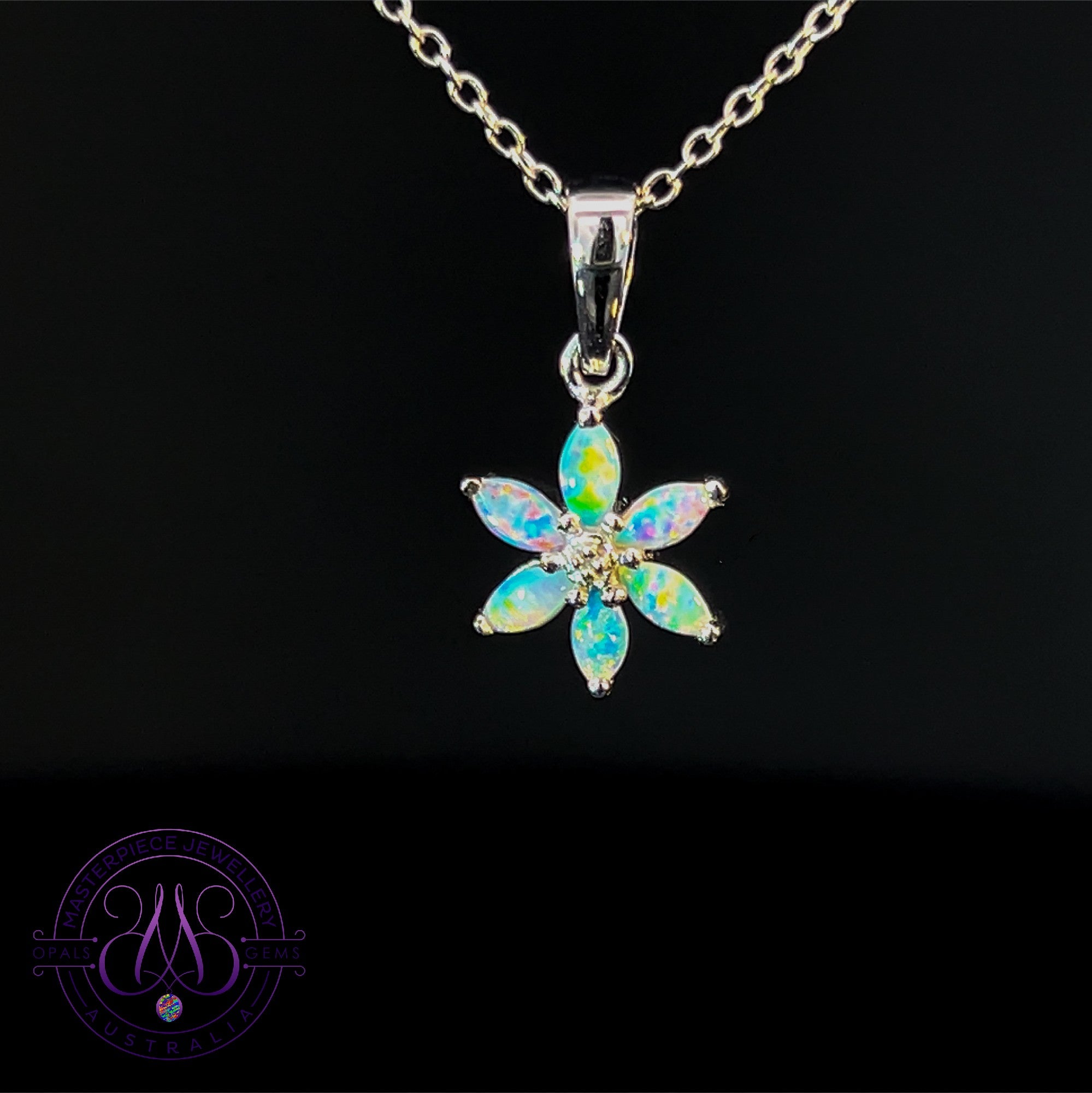 One 9kt White gold floral design Opal pendant