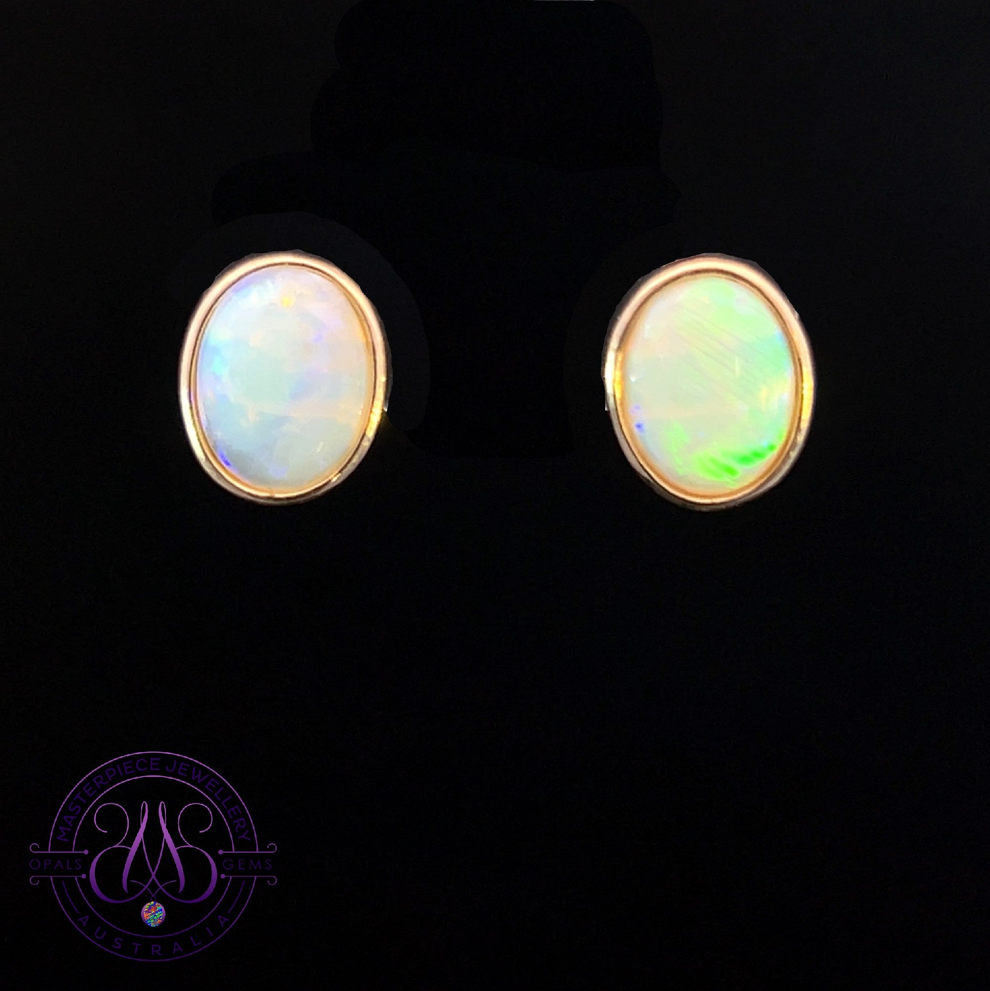 9kt Yellow Gold Oval 10x8mm Light Opal bezel set 2ct earrings