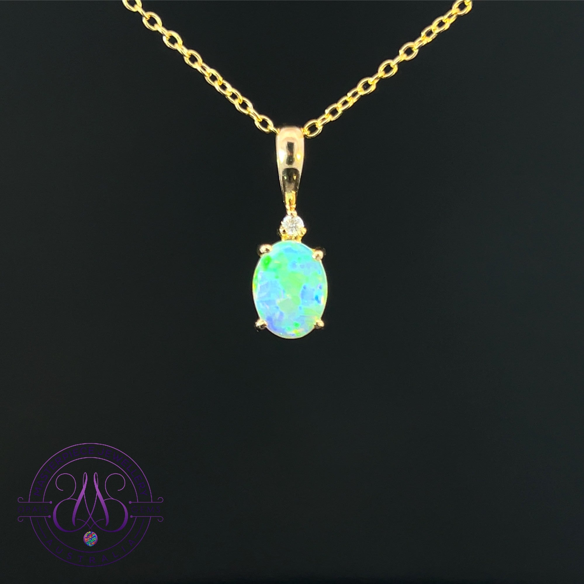 14kt Yellow Gold 8x6mm Crystal Opal and diamond pendant