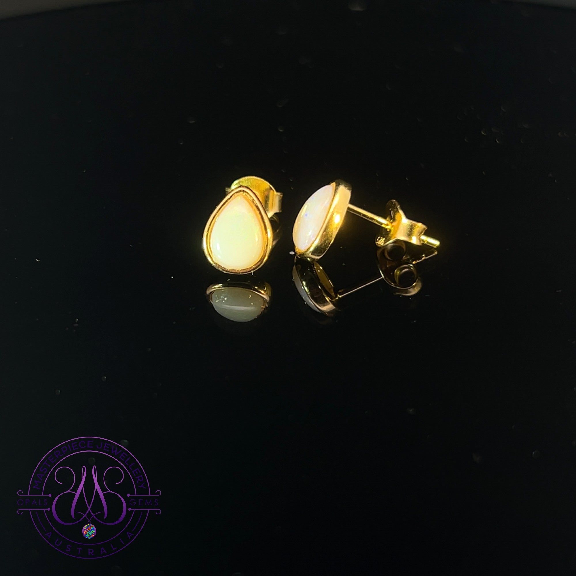 Gold Plated Silver pearshape 7x5mm White Opal studs