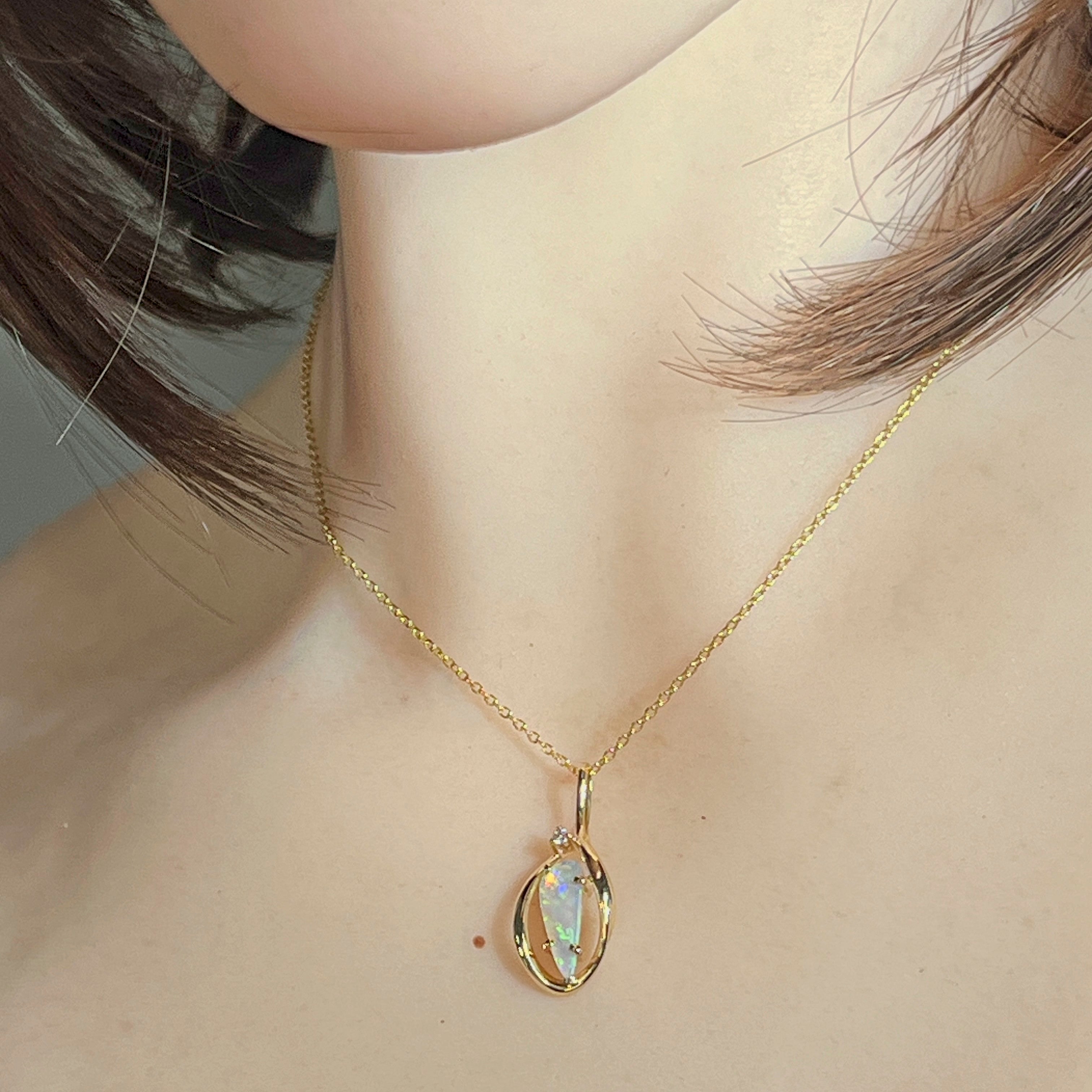 Crystal opal pendant worn, showing how it sits on the neckline