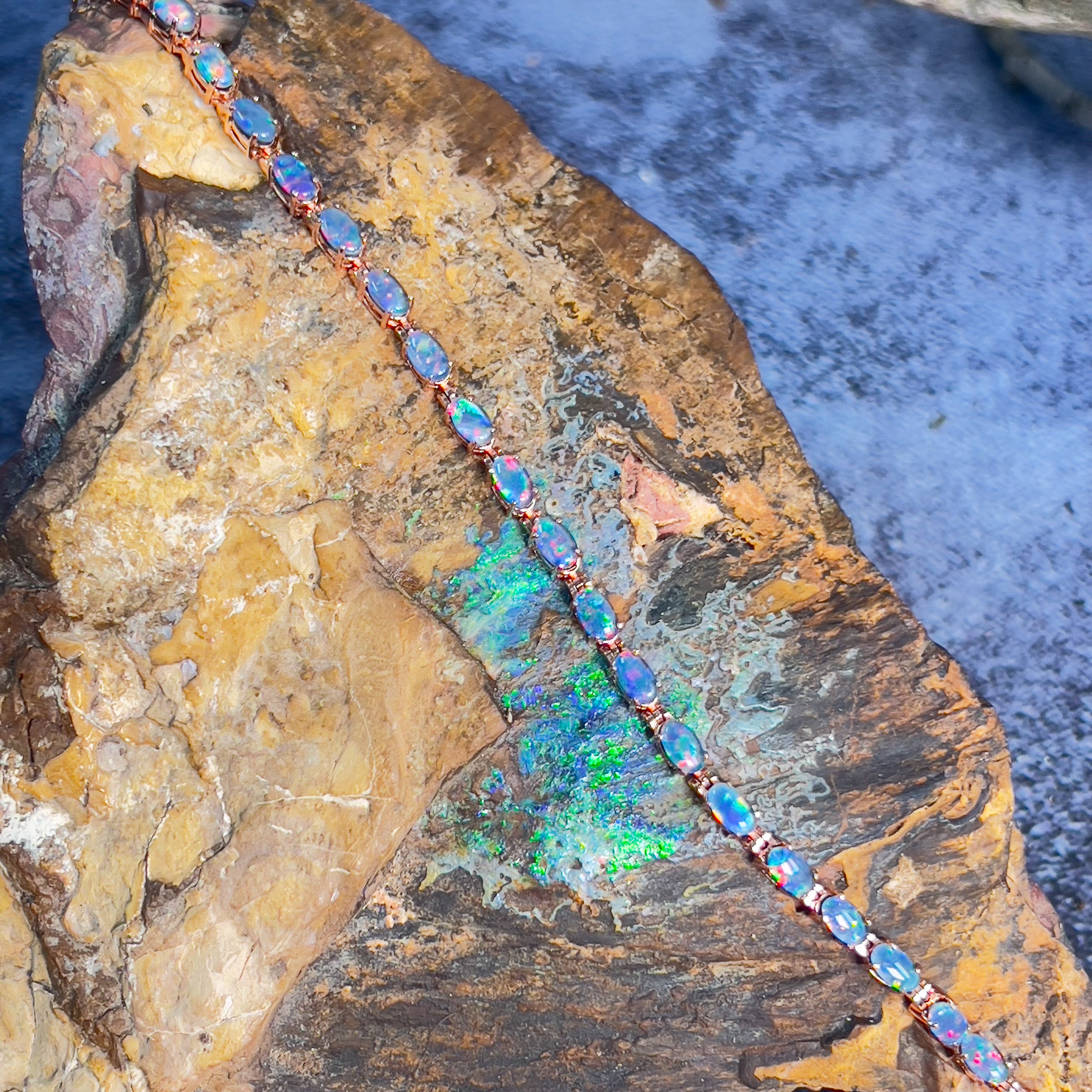 Sterling Silver Rose Gold plated Opal tennis bracelet 5x3mm - Masterpiece Jewellery Opal & Gems Sydney Australia | Online Shop