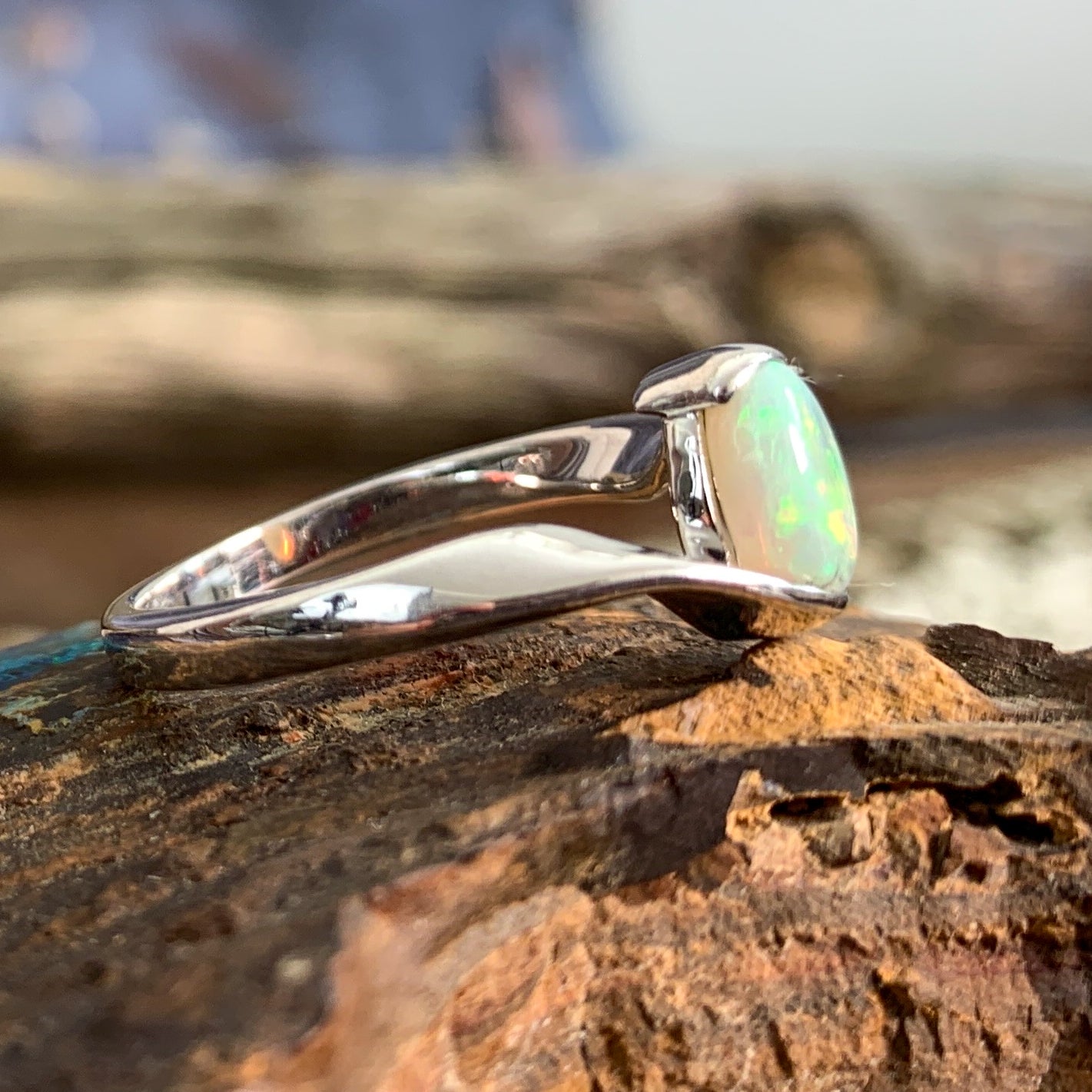 14kt White Gold solitaire cross over ring with 0.7ct Semi Black Opal - Masterpiece Jewellery Opal & Gems Sydney Australia | Online Shop