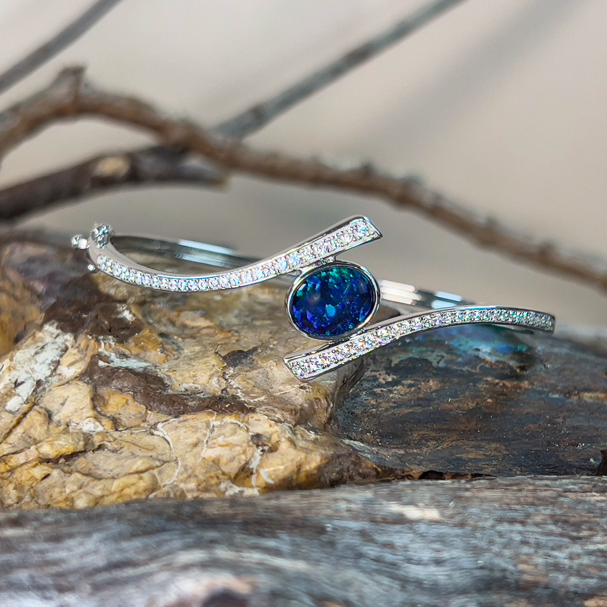 Sterling Silver cross over snap bangle with Opal triplet and cz - Masterpiece Jewellery Opal & Gems Sydney Australia | Online Shop