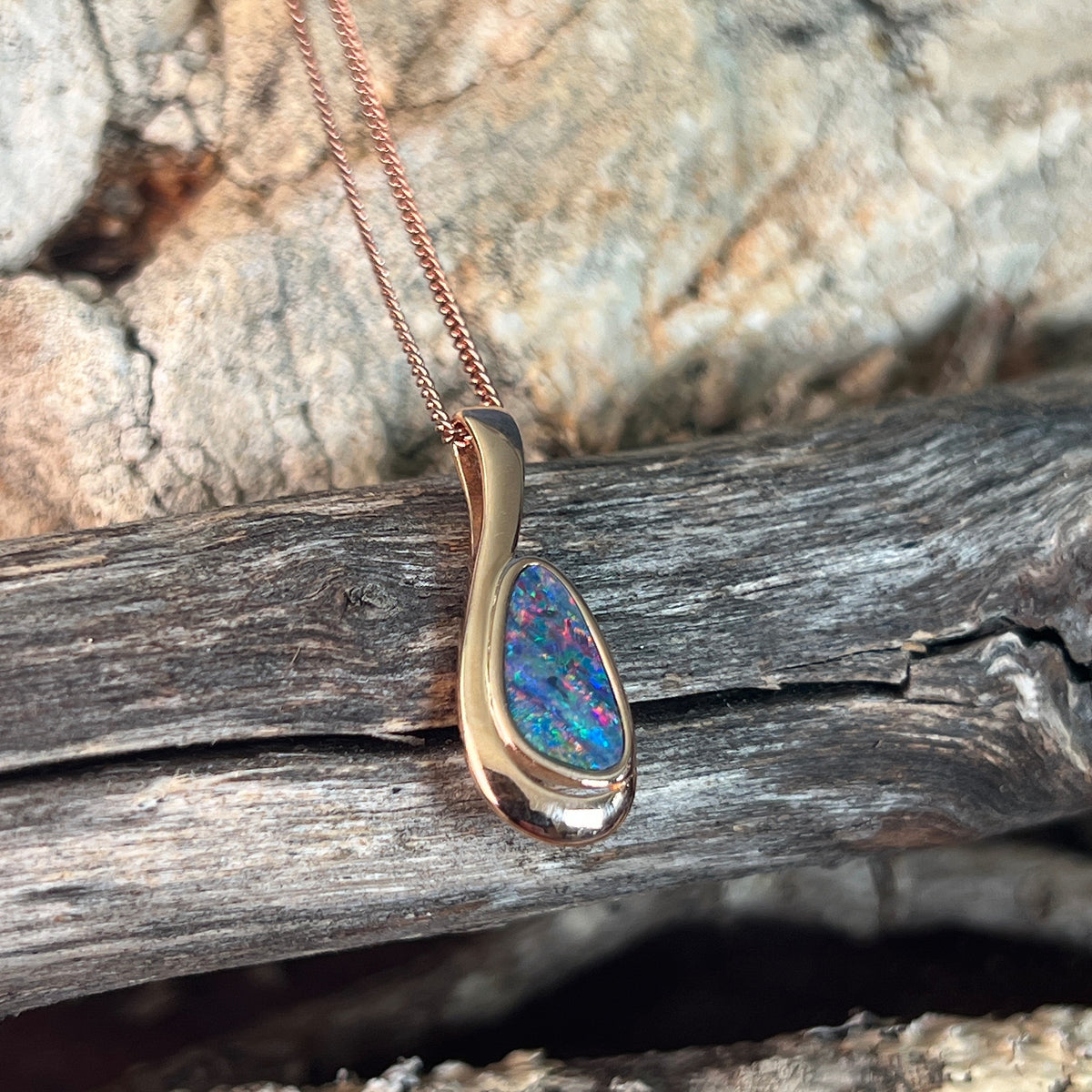 12 x 7mm Australian opal doublet pendant in rose gold-plated silver, red, blue and green