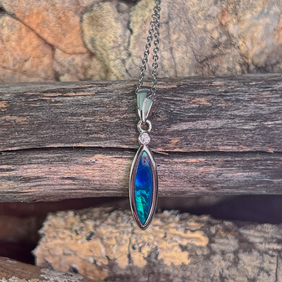 oval Australian opal doublet pendant in sterling silver, blue and green play-of-colour