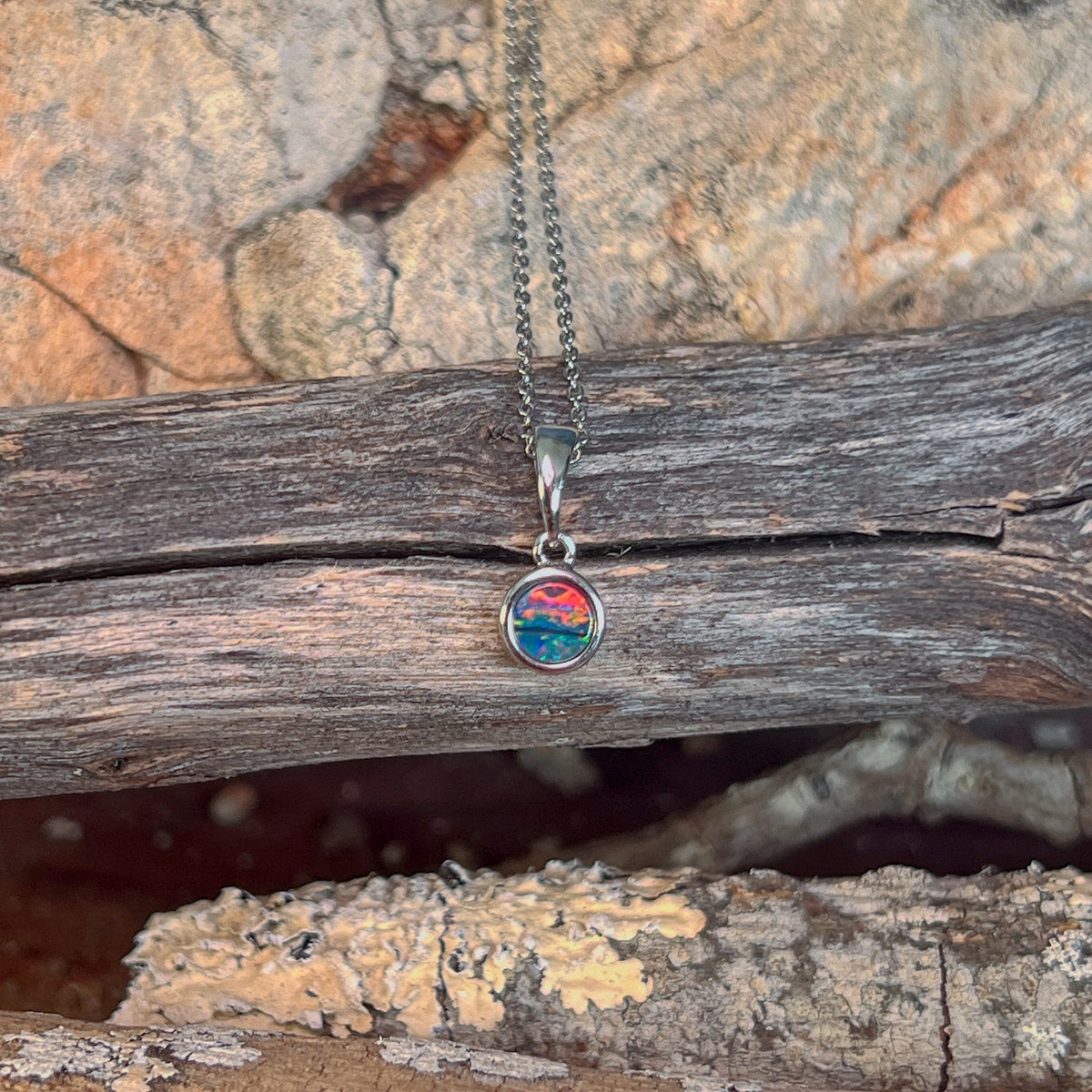 5mm Australian opal doublet pendant in sterling silver, red, blue and green