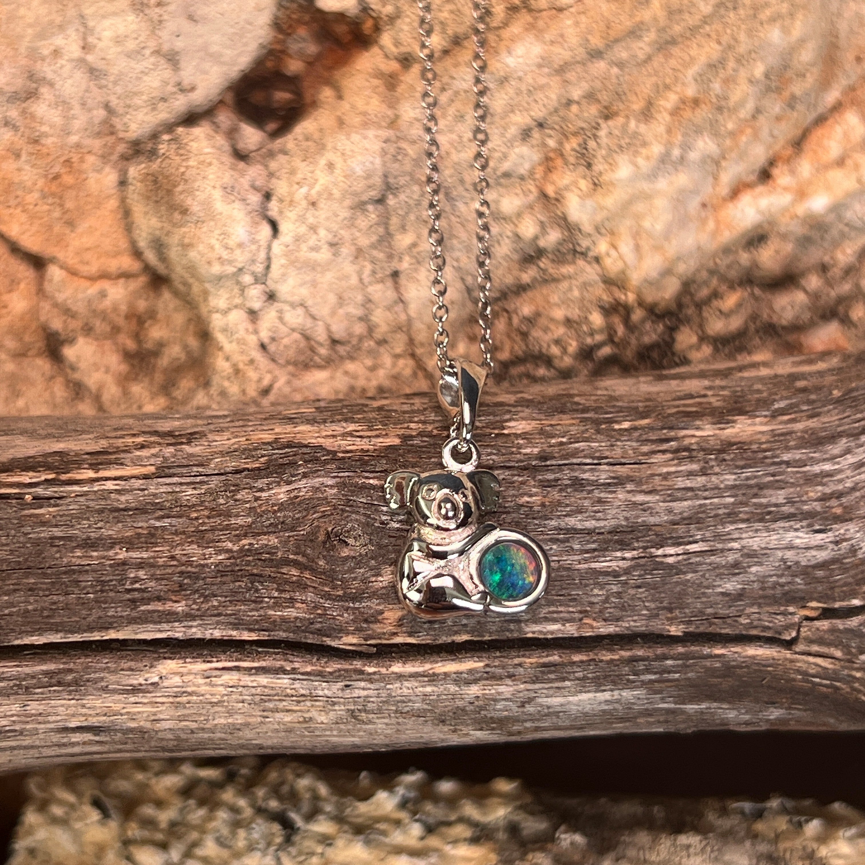 round Australian opal triplet pendant in sterling silver, blue, green and yellow play-of-colour