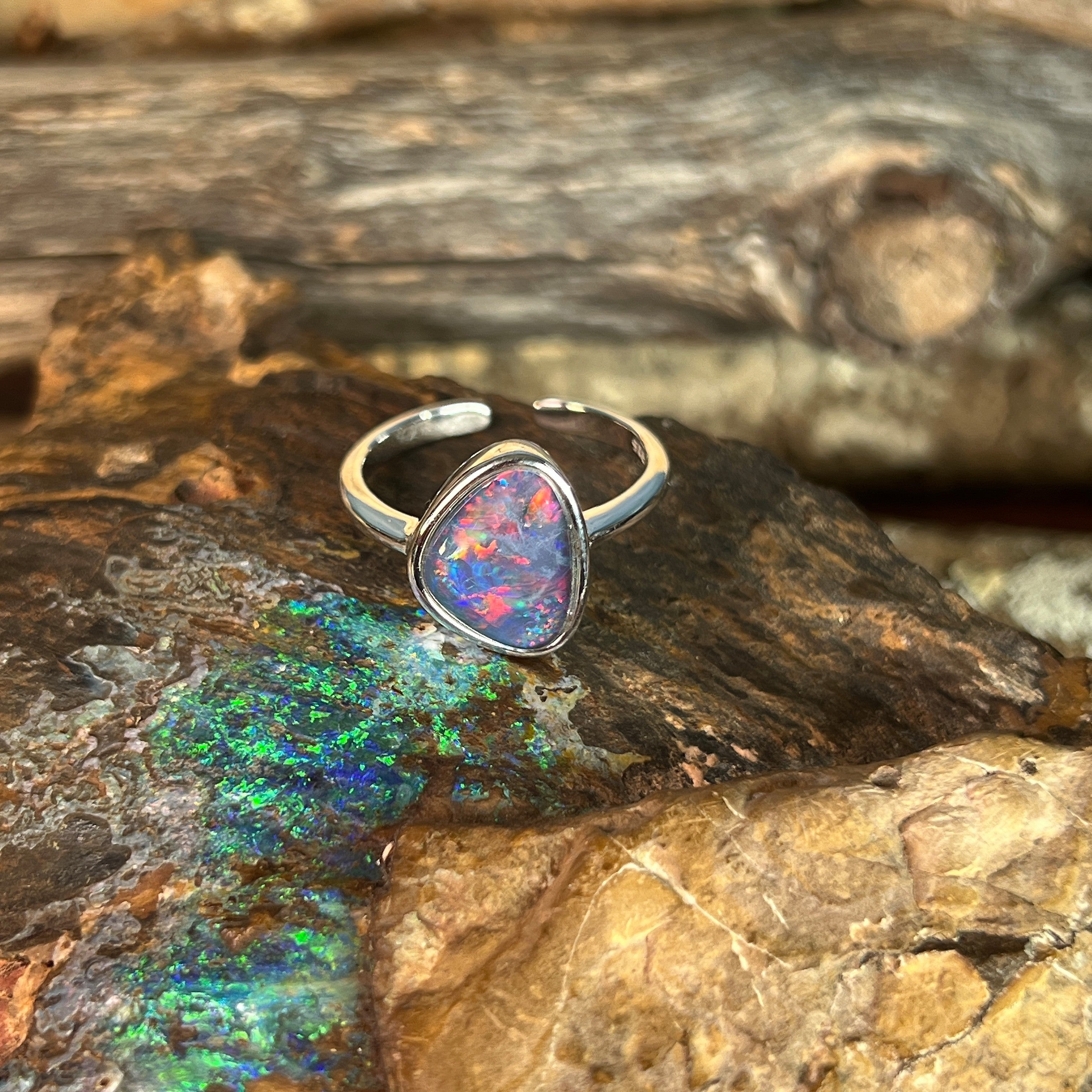 12.5 x 9.5mm Australian opal triplet ring in sterling silver, red, blue and green