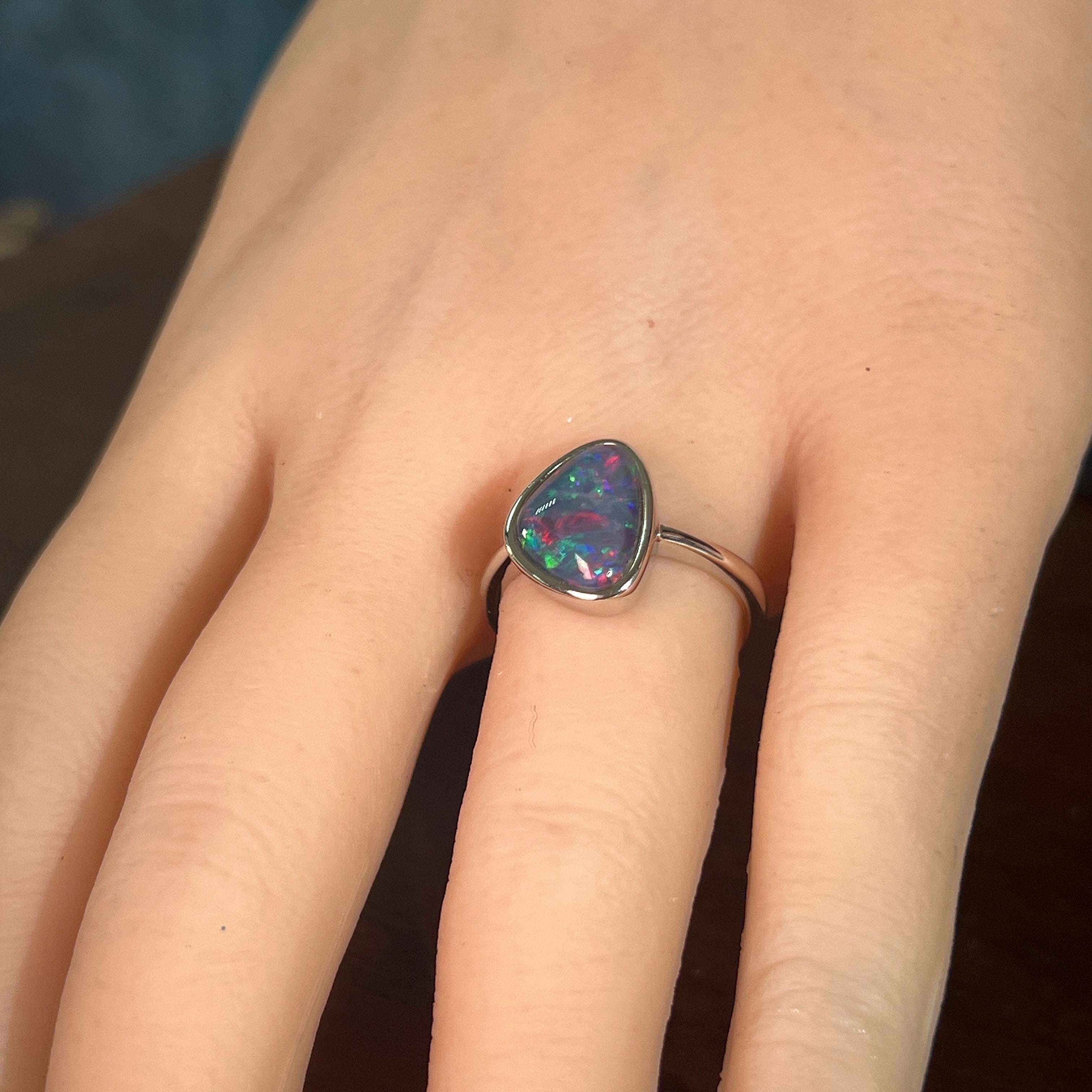 Worn Australian opal triplet ring in sterling silver, red, blue and green, 12.5 x 9.5mm