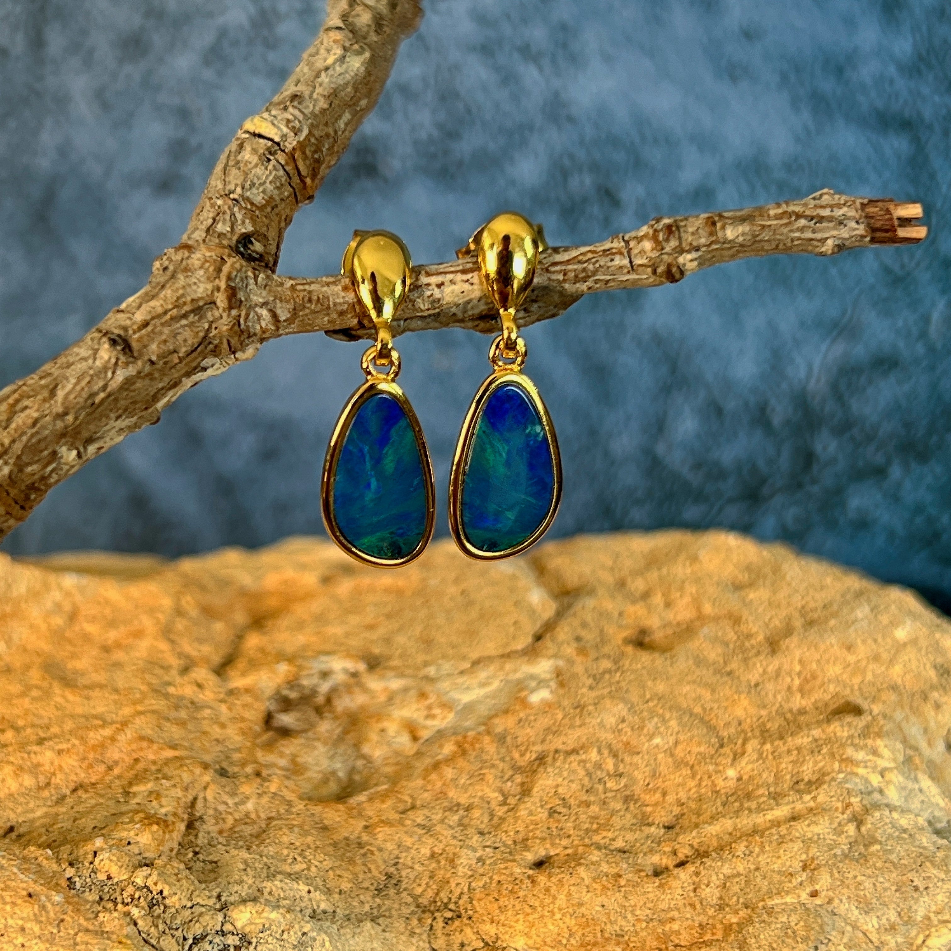 Australian opal doublet earrings, yellow gold-plated silver, 12 x 7mm stones showing green and blue