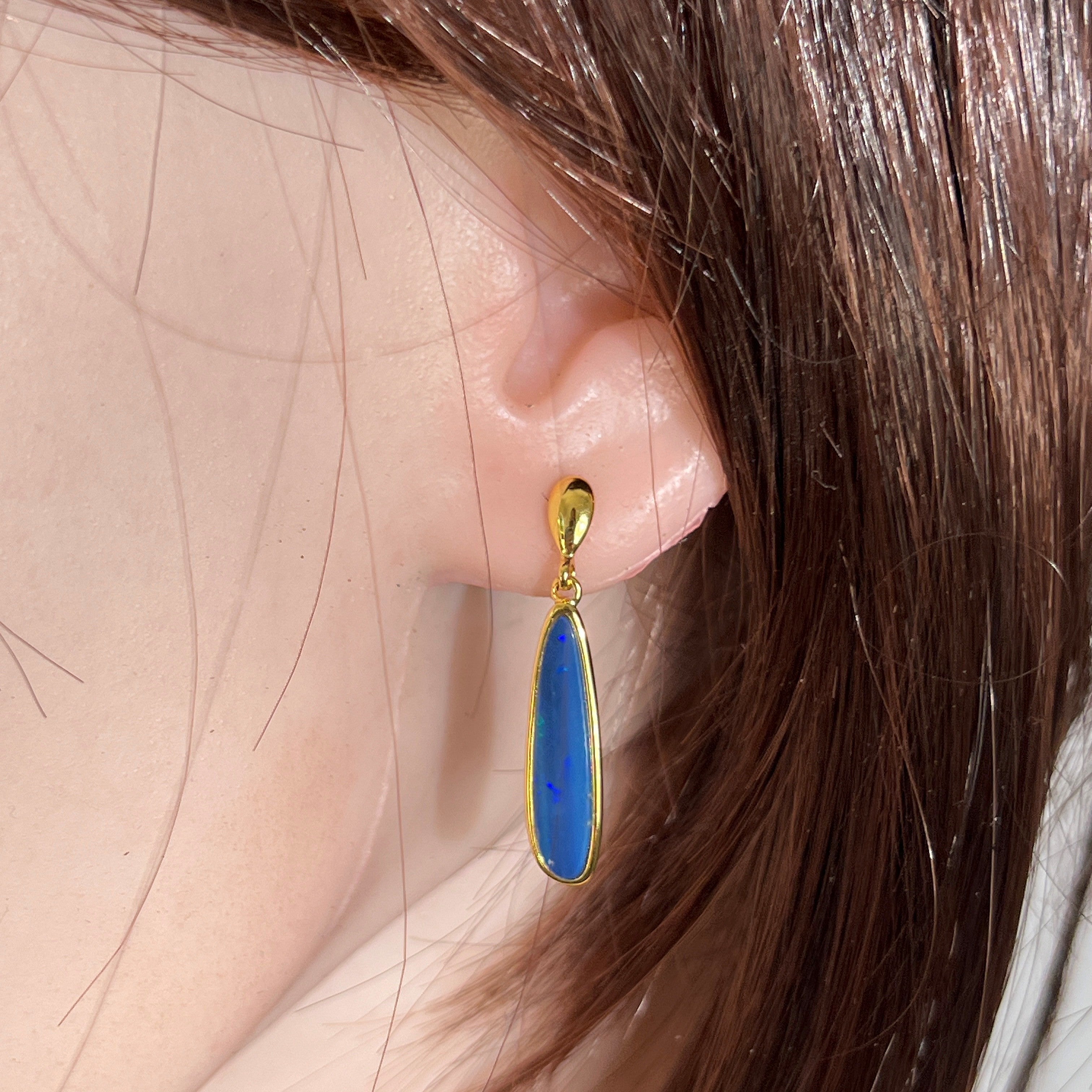 Australian opal doublet earrings worn on the ear, yellow gold-plated silver, 22 x 5.5mm pear-shaped stones