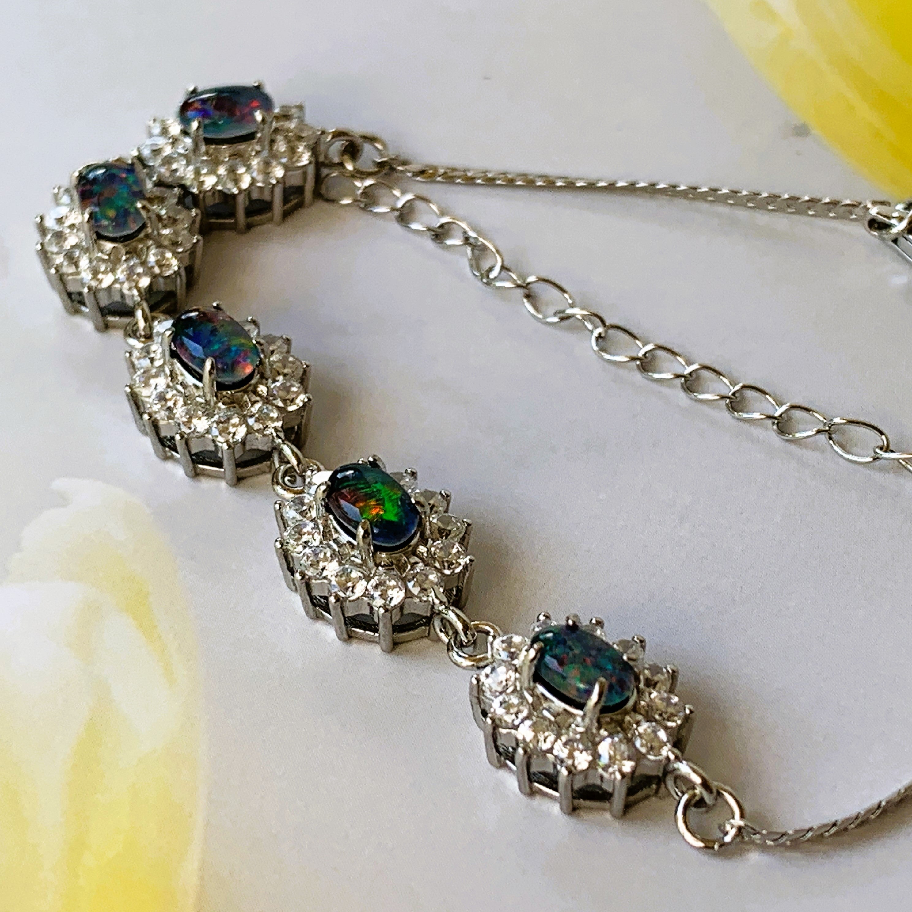 Australian Triplet Opals surrounded by cubic zirconia bracelet set in Sterling Silver - Masterpiece Jewellery Opal & Gems Sydney Australia | Online Shop