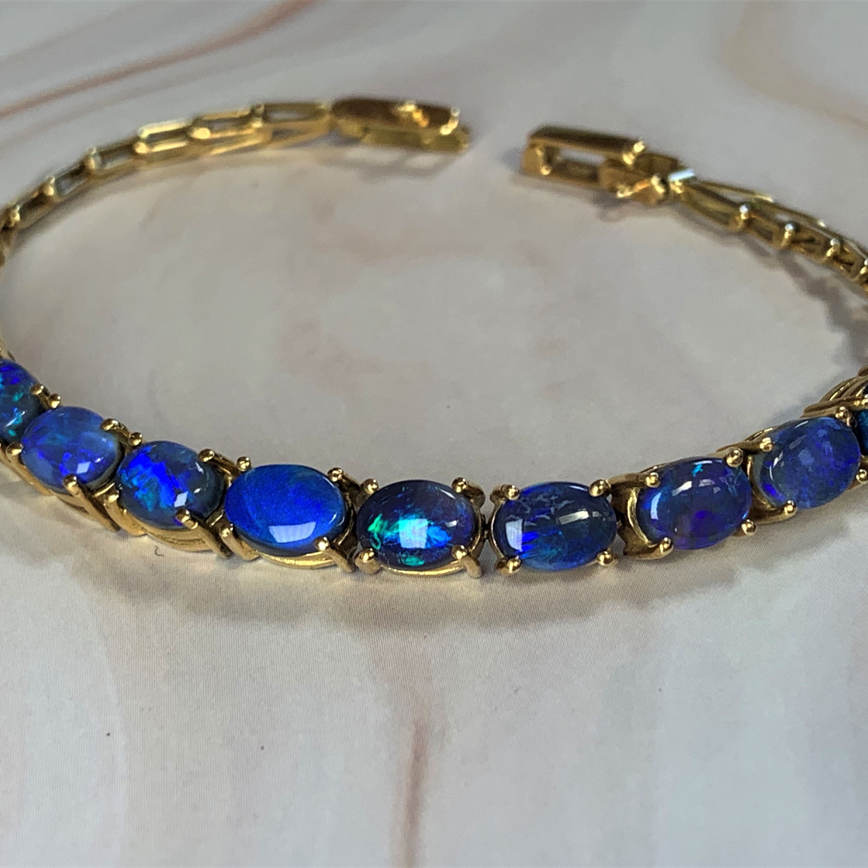 18kt Yellow Gold Black Opal 4.2ct bracelet - Masterpiece Jewellery Opal & Gems Sydney Australia | Online Shop