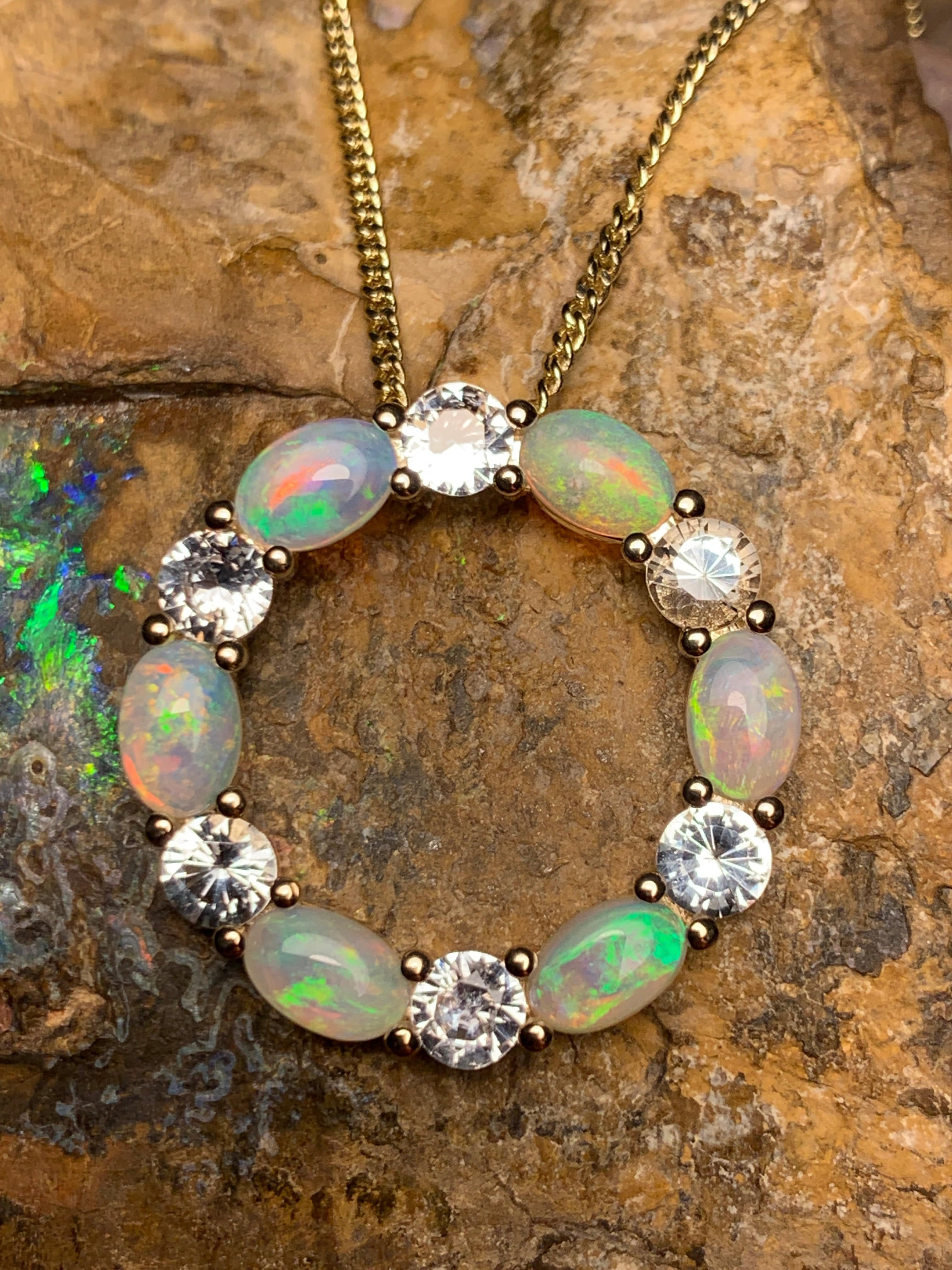 14kt Yellow Gold Circle of Life Opal and Sapphire pendant - Masterpiece Jewellery Opal & Gems Sydney Australia | Online Shop