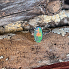 18kt white gold ring with a 1.4ct Australian black opal and two round brilliant diamonds