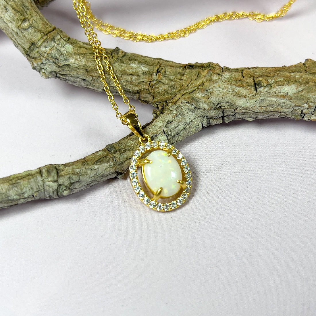 Gold plated Sterling Silver 9x7mm White Opal halo pendant - Masterpiece Jewellery Opal & Gems Sydney Australia | Online Shop