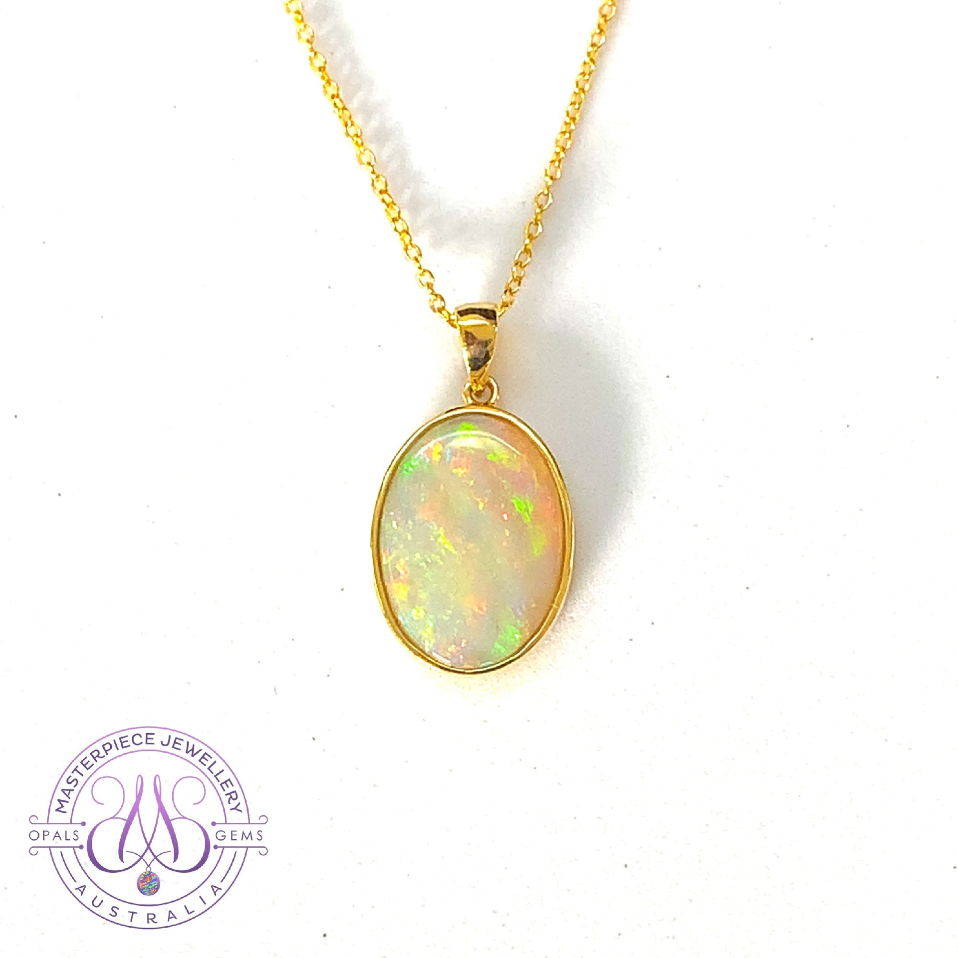 18kt Yellow Gold bezel set Oval Opal pendant – Masterpiece