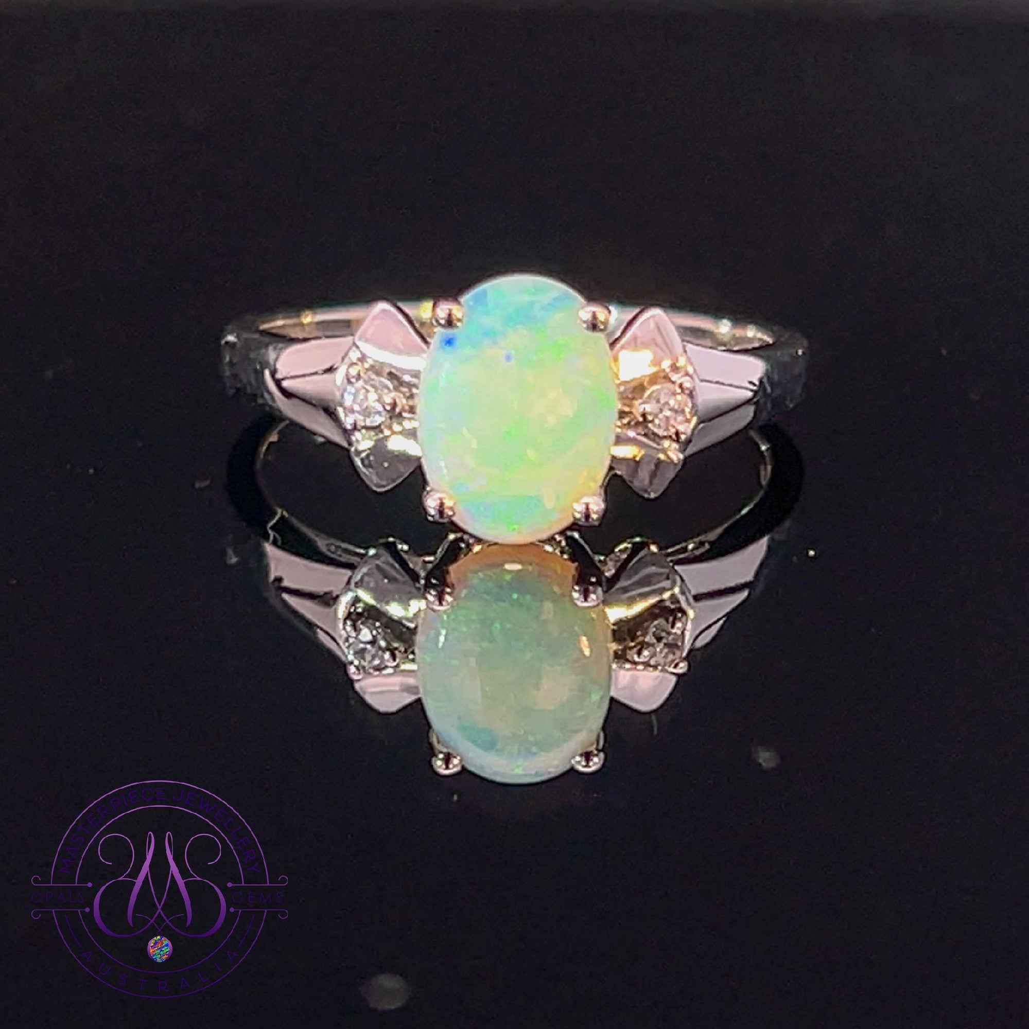 Sterling Silver 8x6mm Light Opal and cz ring