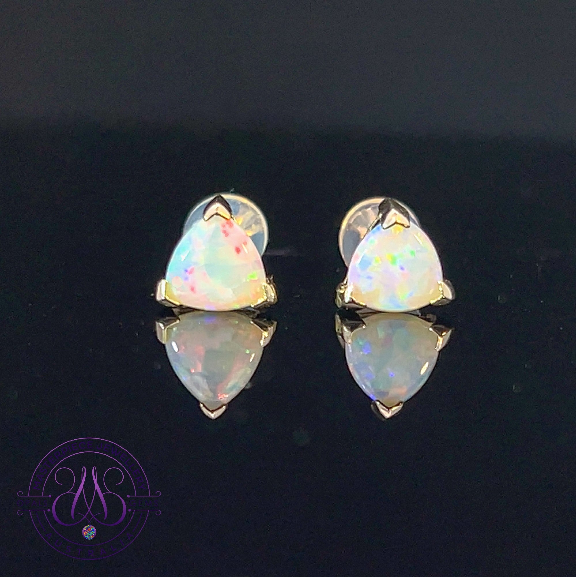 9kt Yellow Gold pair of trillion cut Opal earrings