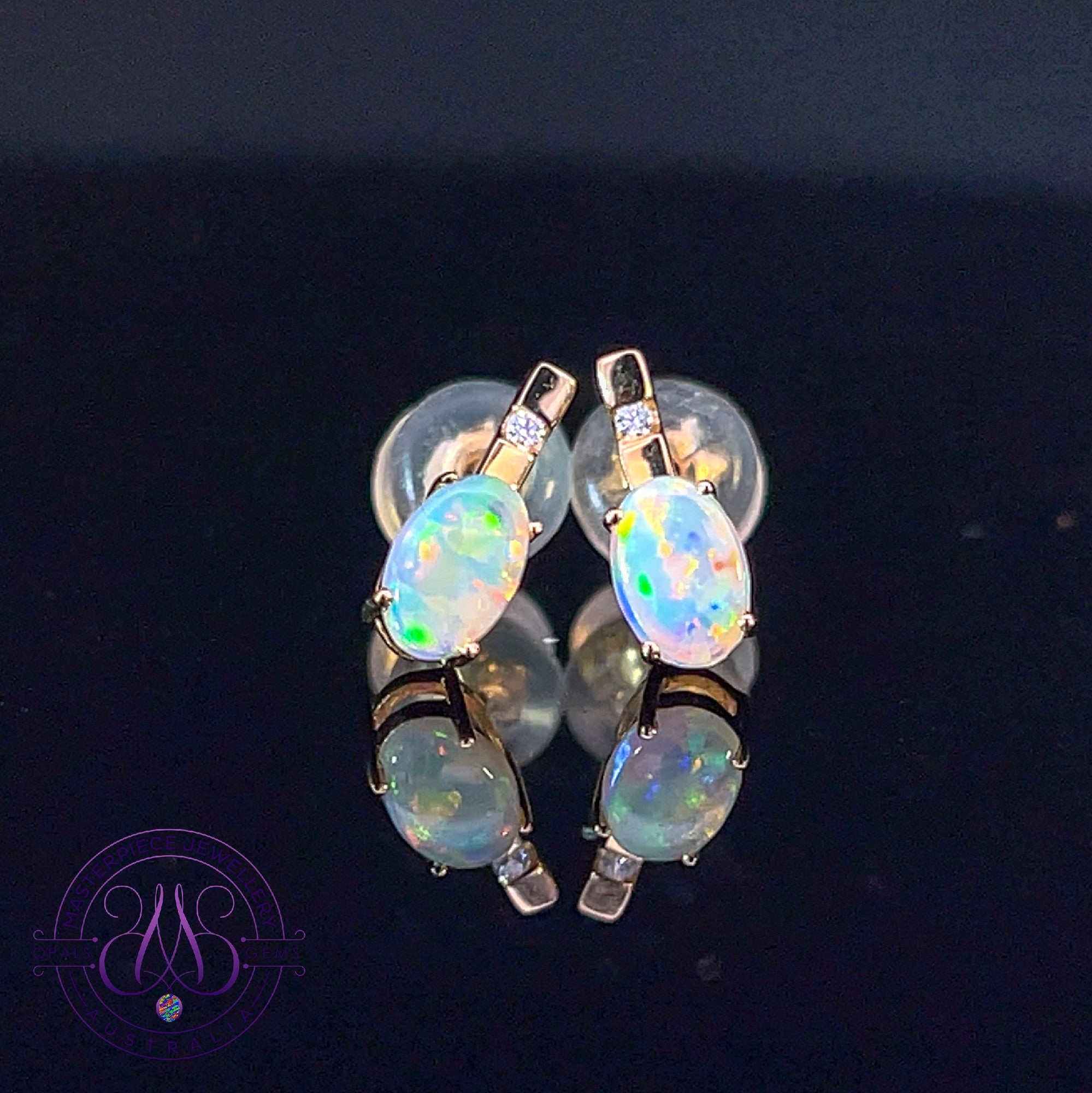 14kt Yellow Gold Opal 6x4mm and diamond studs 