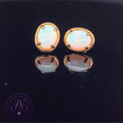 Gold plated Sterling Silver White Opal 10x8mm studs claw set with bezel design studs