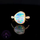 18kt Yellow Gold Crystal Opal 1.1ct and diamond ring
