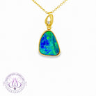 14kt Yellow Gold Opal doublet 4.4ct and diamond pendant bezel set