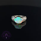 14kt White Gold Australian Crystal Opal 2.84ct solitaire pattern cut out ring