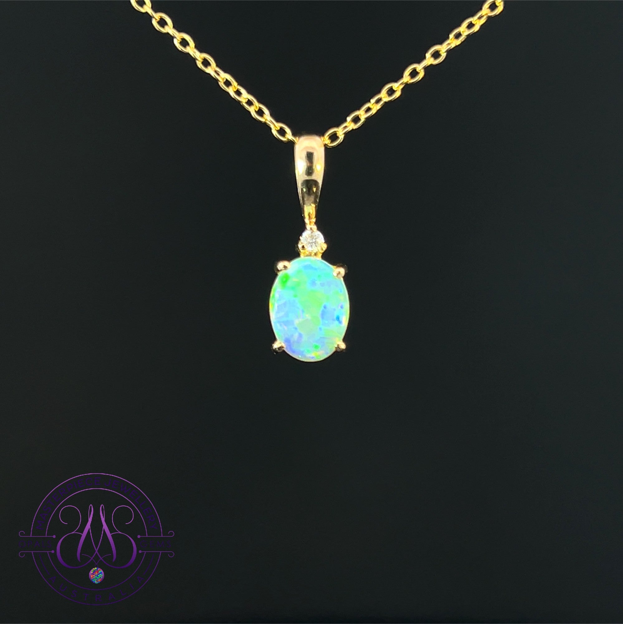 14kt Yellow Gold 8x6mm Crystal Opal and diamond pendant