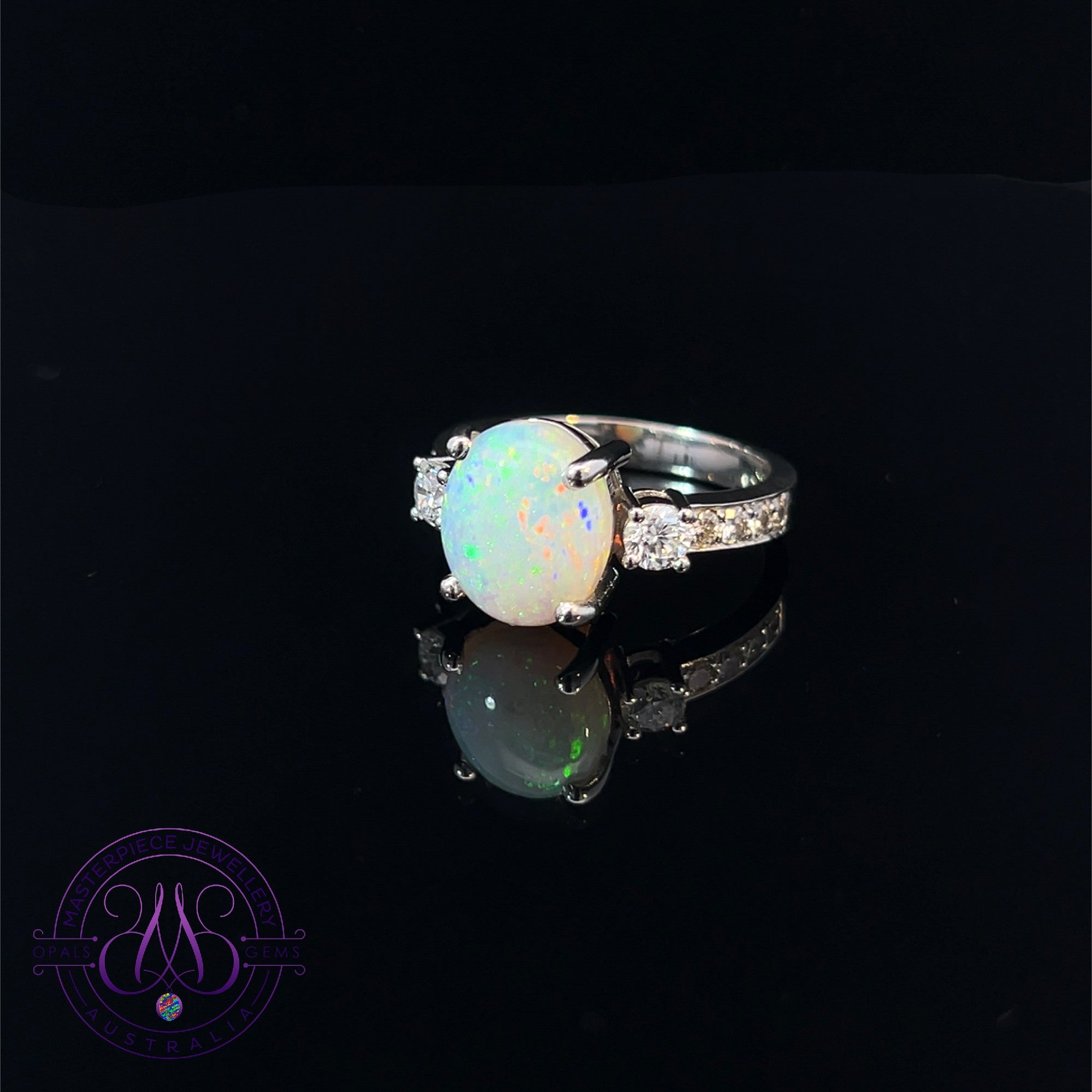 Platinum Crystal Opal 2.6ct and diamond ring