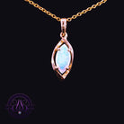 9kt yellow gold marquise pendant set with a 0.5ct crystal opal