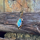 0.5ct Australian crystal opal in a marquise 9kt yellow gold frame