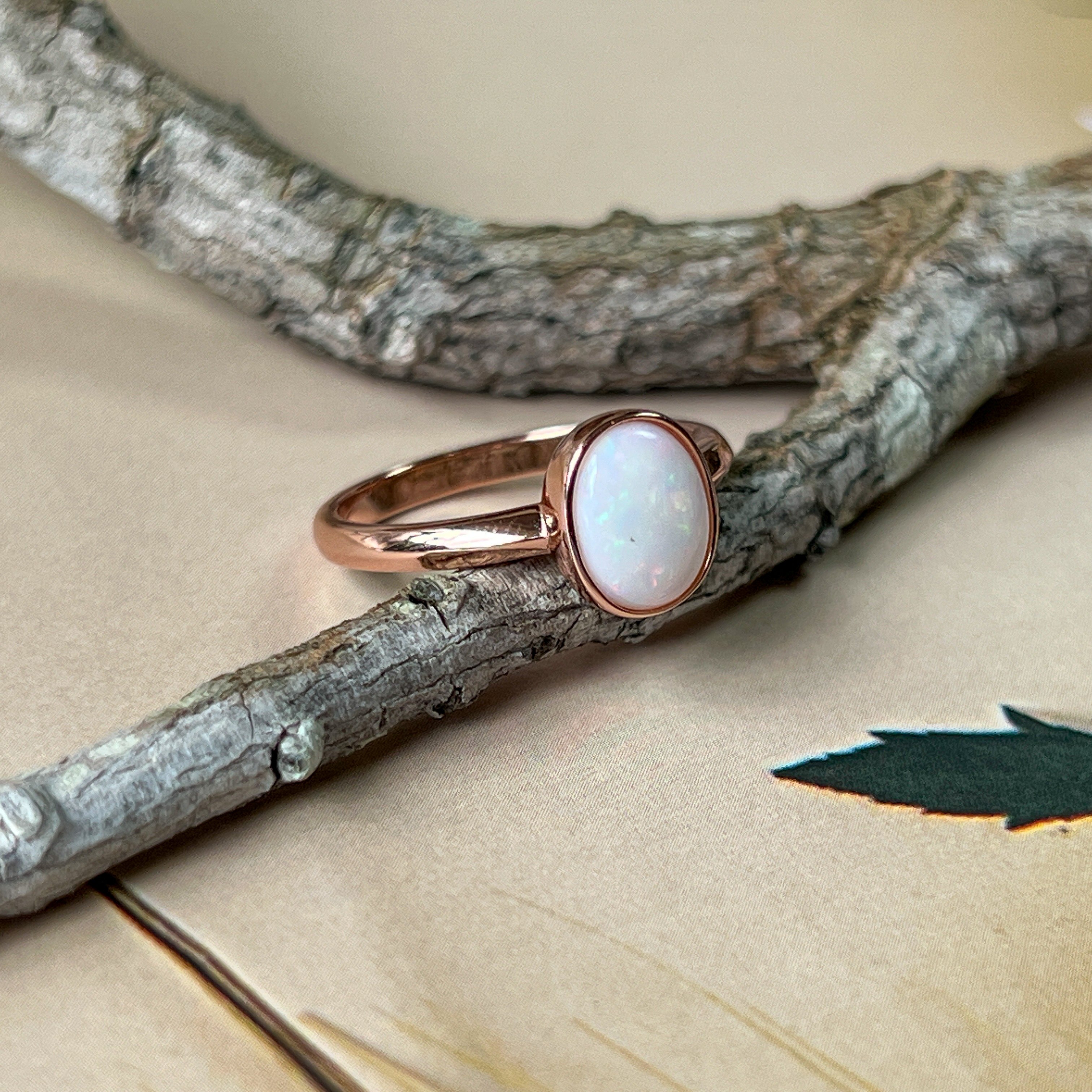Bezel-Set Solitaire White Opal Ring - 10x8mm, Rose Gold-Plated Sterling Silver, Elegant Minimalist Jewelry, Perfect Gift for Her - Masterpiece Jewellery Opal & Gems Sydney Australia | Online Shop