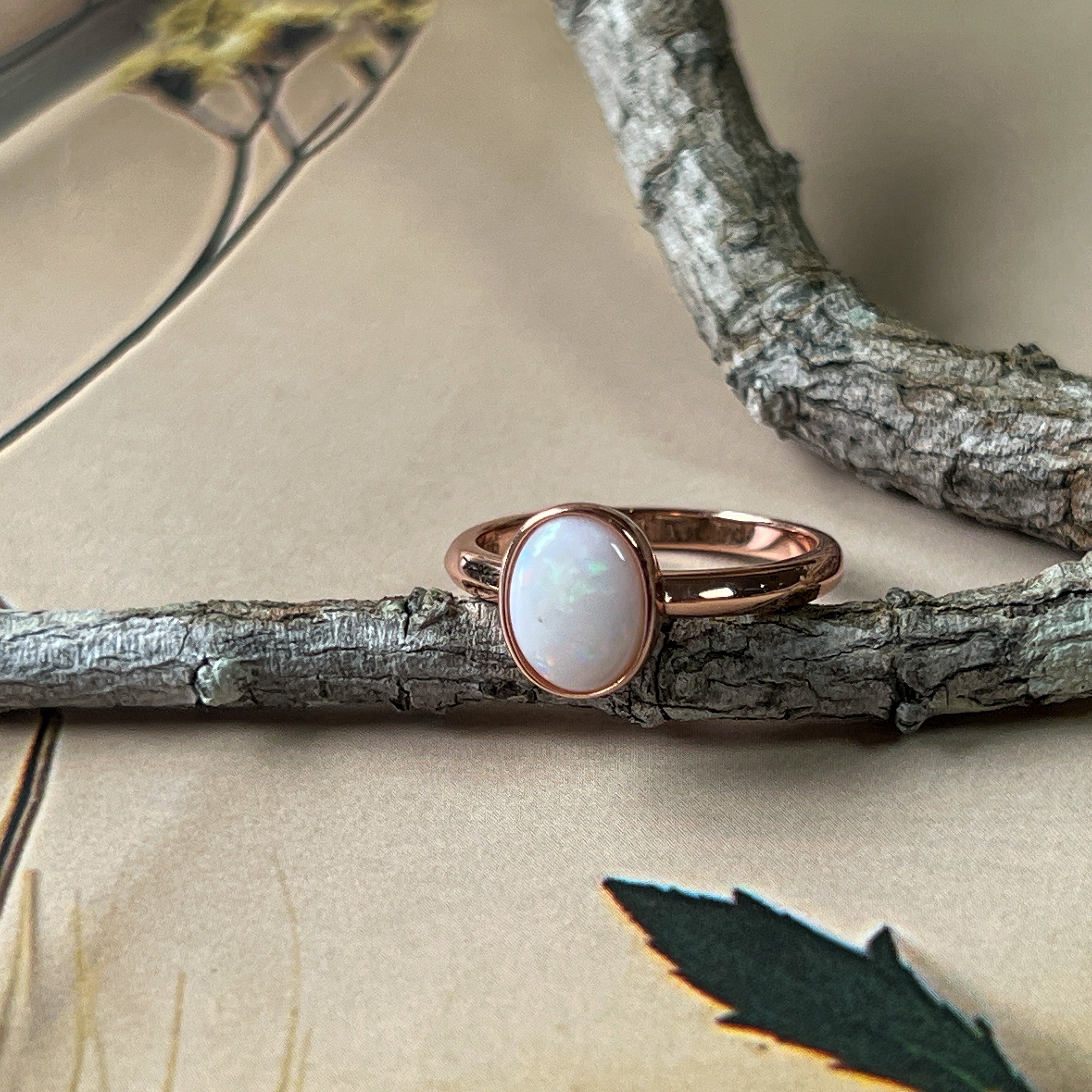 Bezel-Set Solitaire White Opal Ring - 10x8mm, Rose Gold-Plated Sterling Silver, Elegant Minimalist Jewelry, Perfect Gift for Her - Masterpiece Jewellery Opal & Gems Sydney Australia | Online Shop