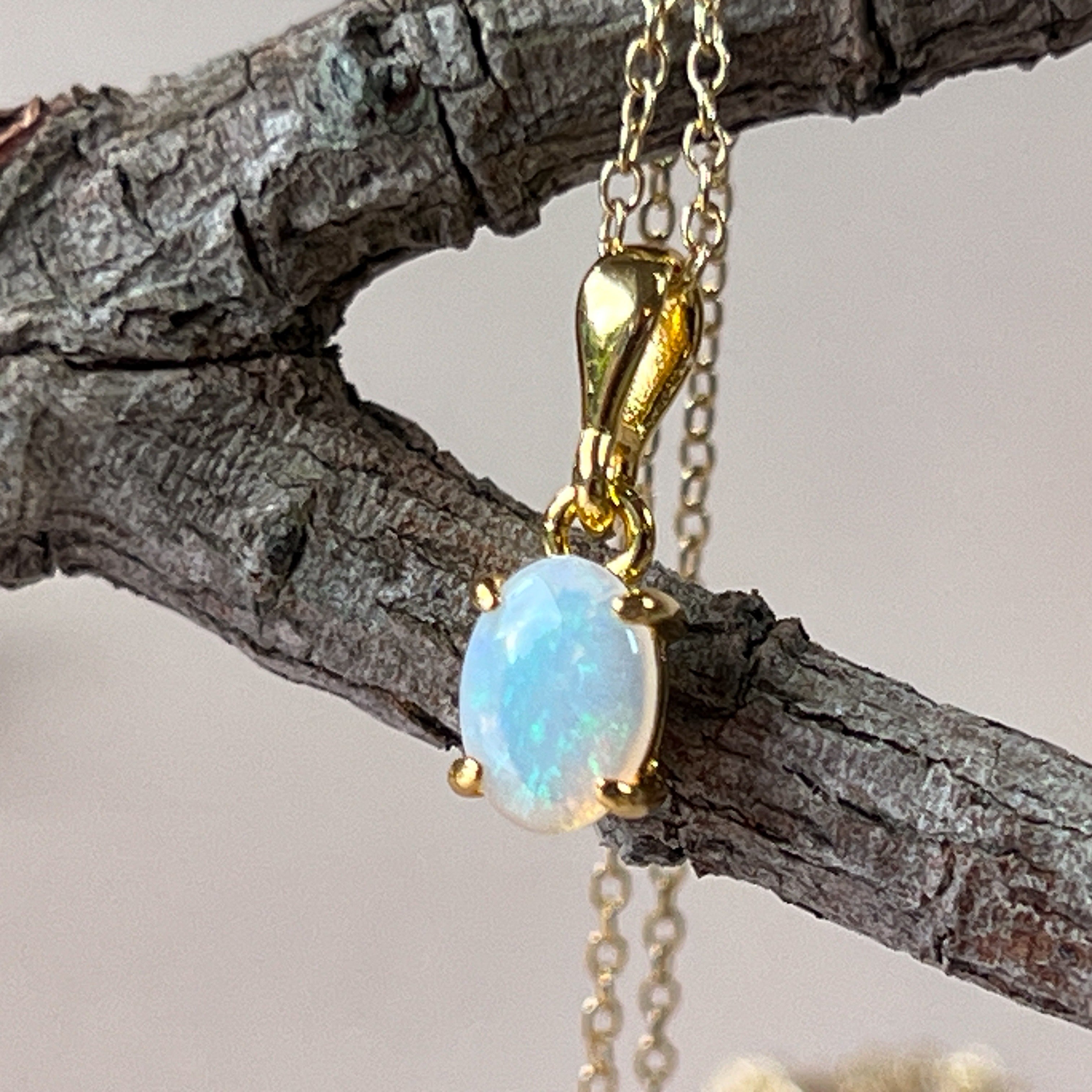 Gold plated sterling silver 7x5mm White Opal pendant 4 claw - Masterpiece Jewellery Opal & Gems Sydney Australia | Online Shop