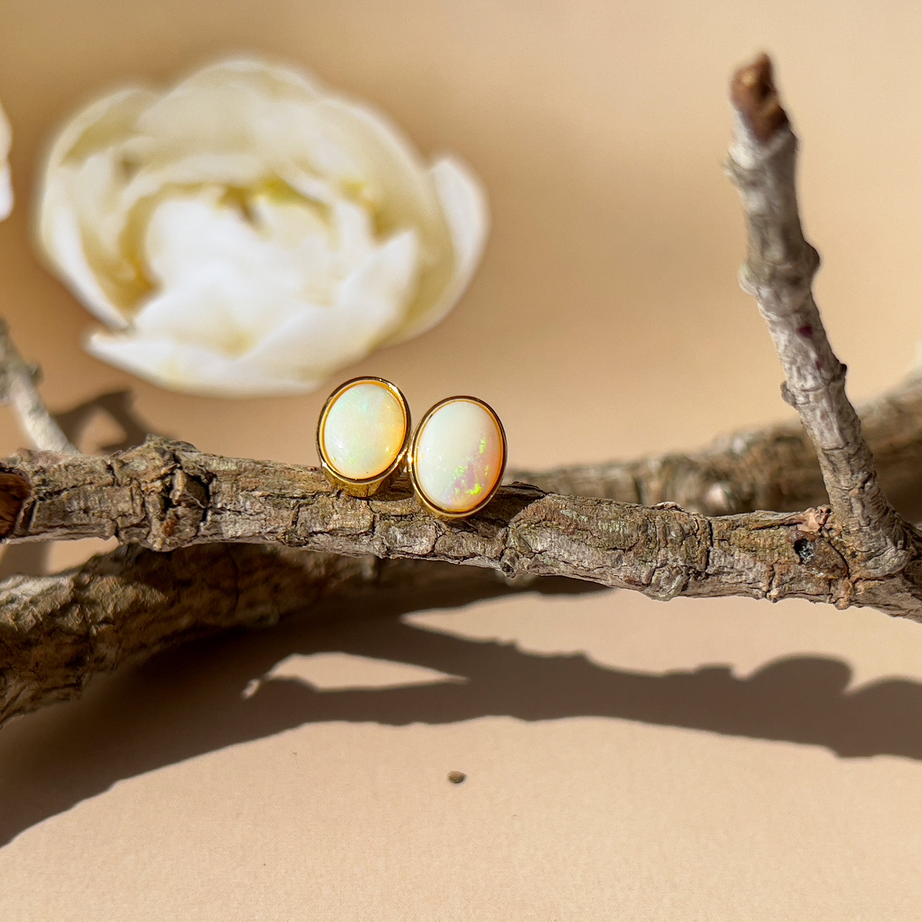 One pair of Gold plated sterling silver 8x6mm White Opal earrings bezel set - Masterpiece Jewellery Opal & Gems Sydney Australia | Online Shop