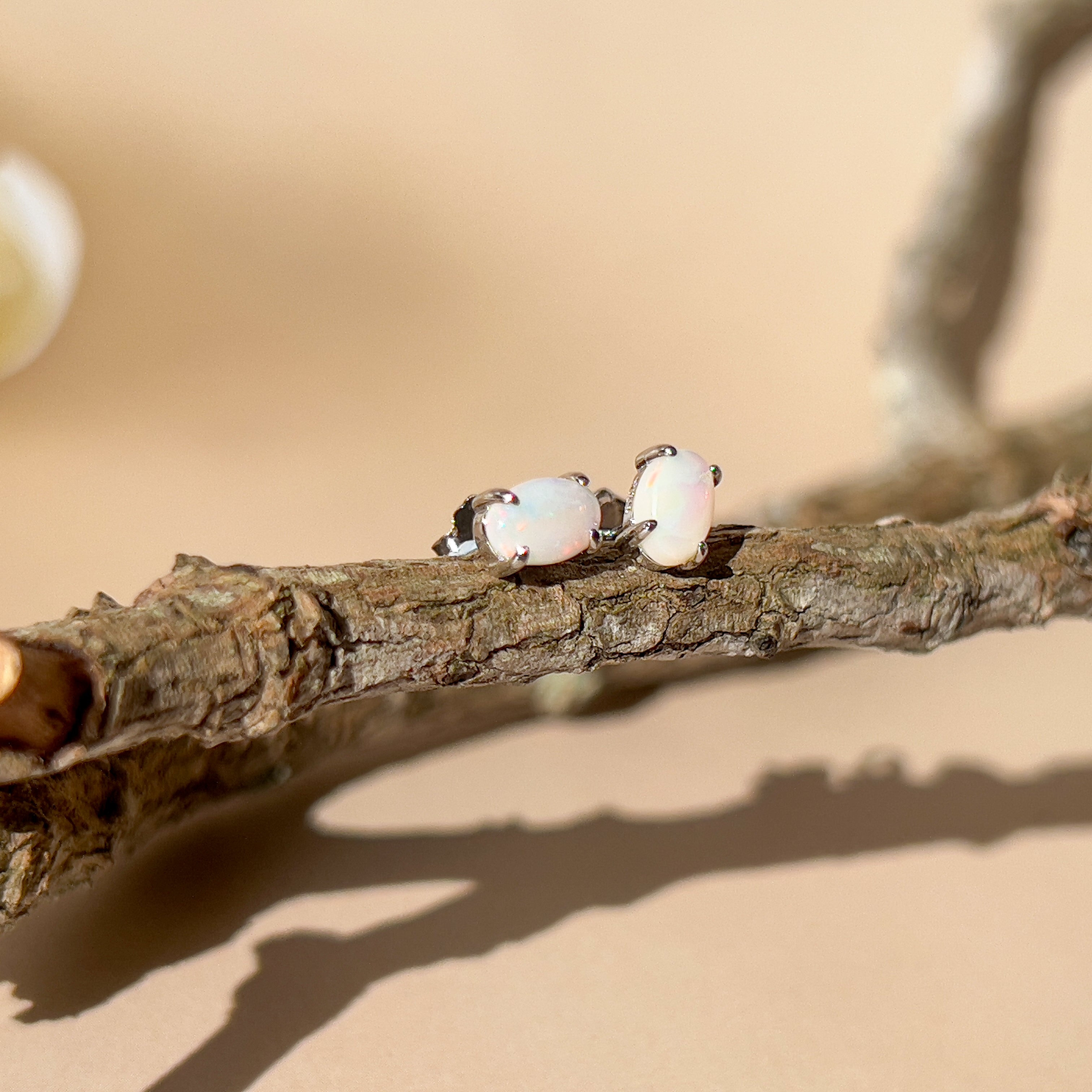 Pair of Sterling Silver 6x4mm White Opal earrings studs claw set - Masterpiece Jewellery Opal & Gems Sydney Australia | Online Shop