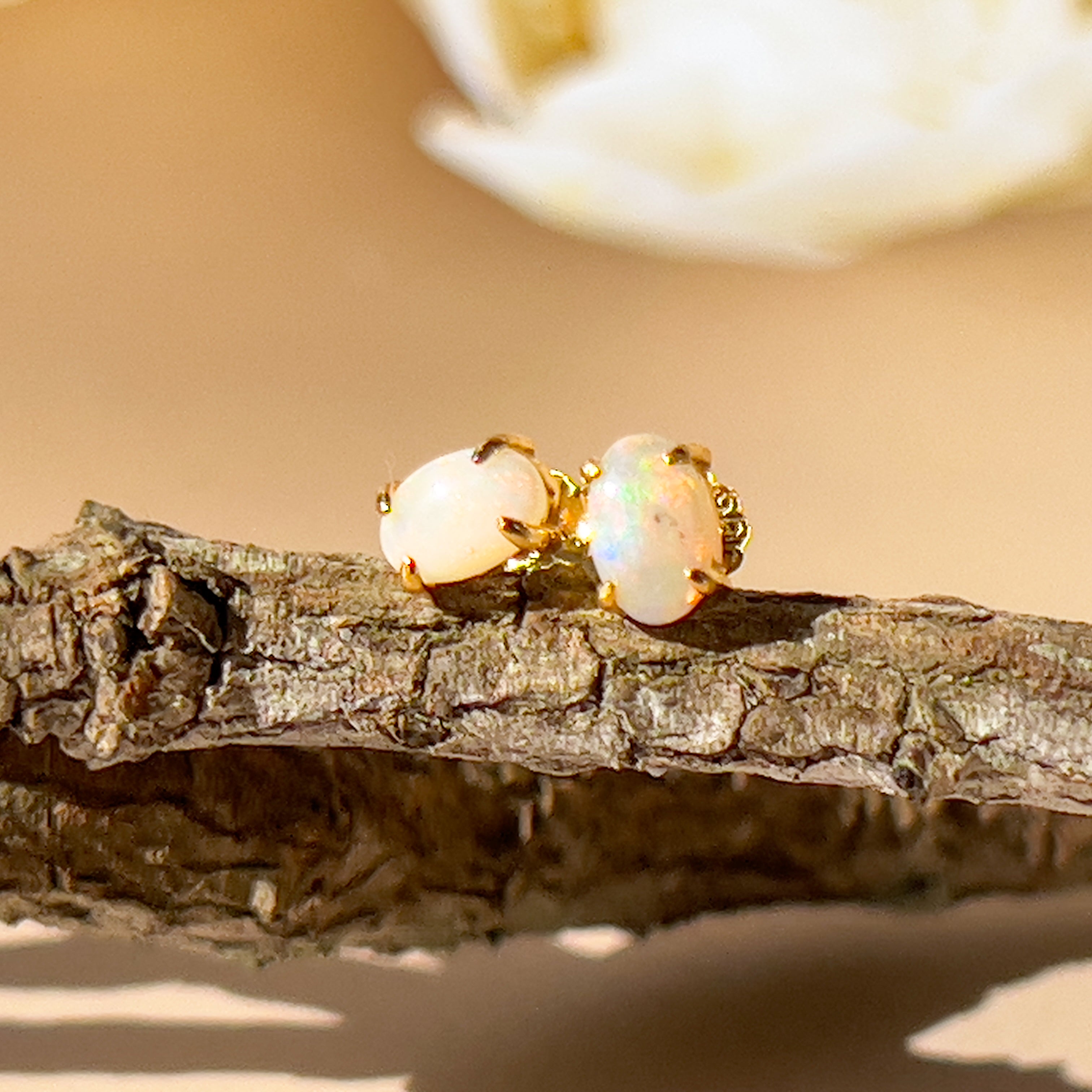 One pair of 9kt Yellow gold 5x3mm Crystal Opal earrings 4 claw studs - Masterpiece Jewellery Opal & Gems Sydney Australia | Online Shop