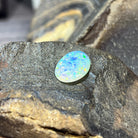 5.54ct crystal opal with blue-green play-of-colour and warm orange flecks