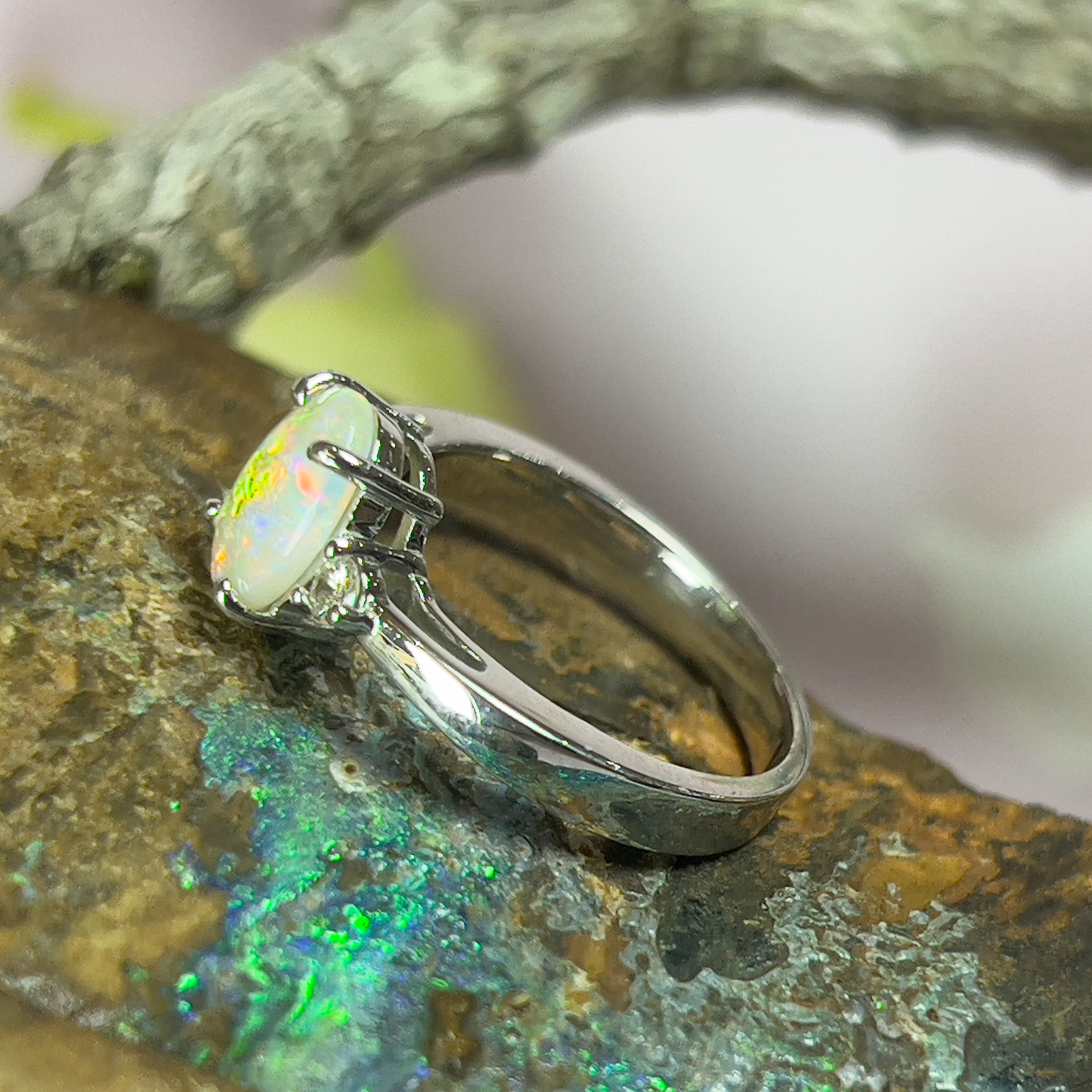 White Crystal Opal Diamond Ring in sunlight on Vimeo
