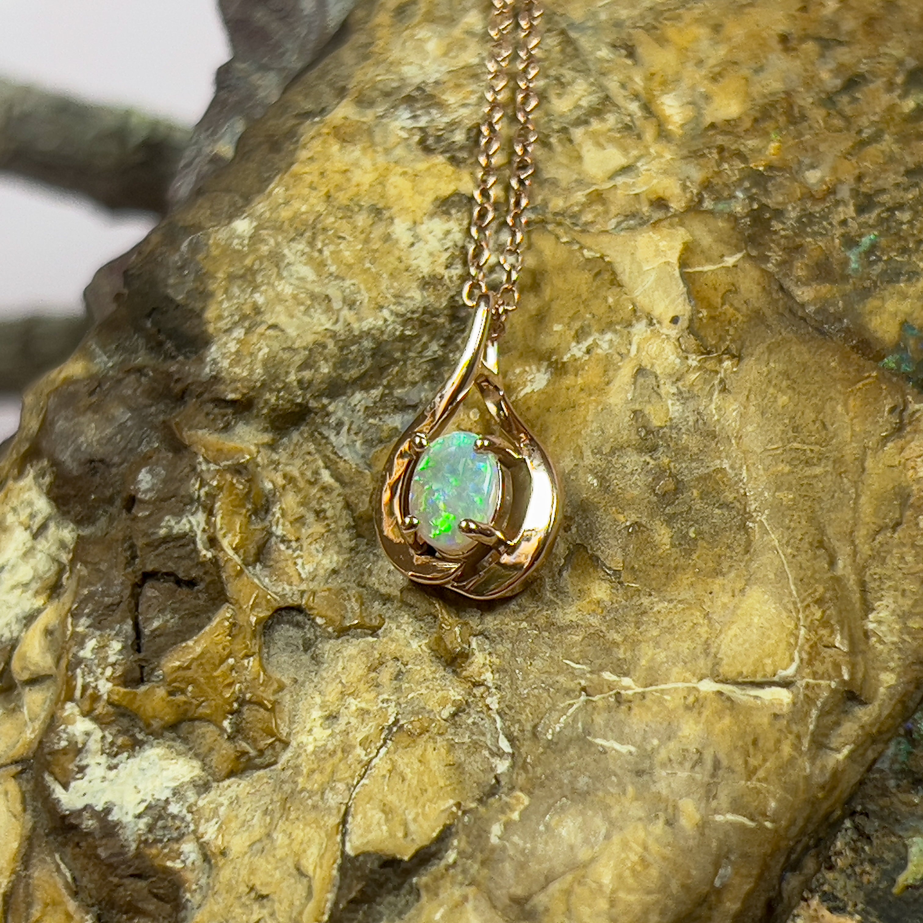 14kt Rose Gold swirl pendant with one Black Opal 0.33ct - Masterpiece Jewellery Opal & Gems Sydney Australia | Online Shop