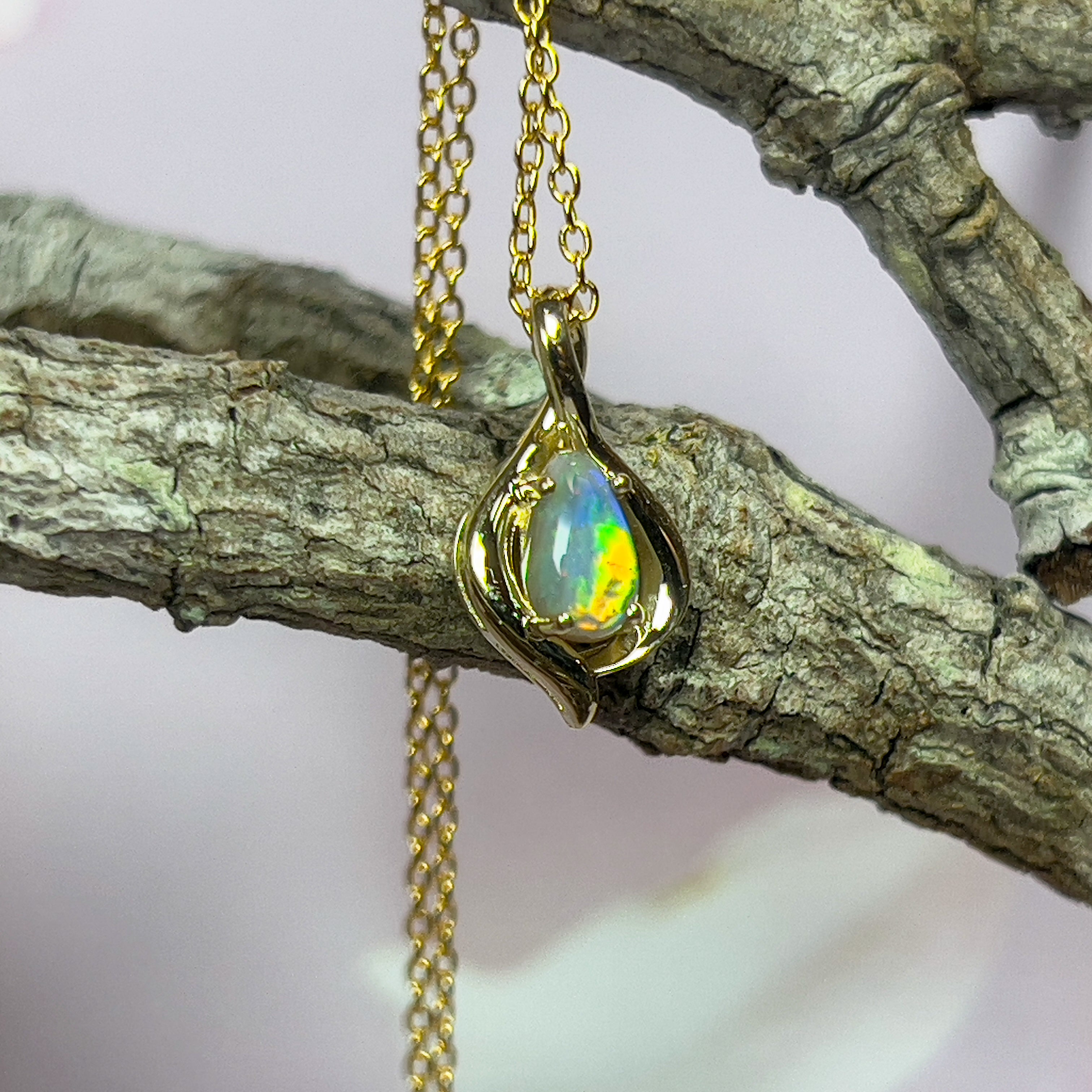 14kt Yellow Gold pendant with one Black teardrop opal 0.5ct - Masterpiece Jewellery Opal & Gems Sydney Australia | Online Shop