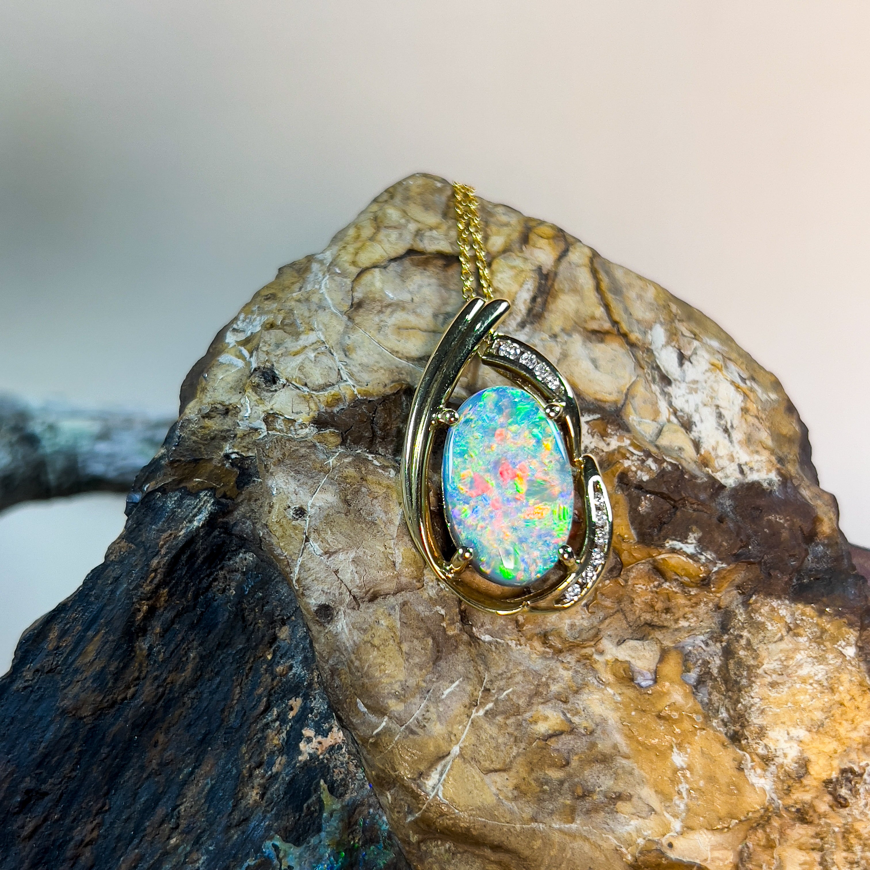 18kt Yellow Gold 5.39ct Black Opal and diamond pendant - Masterpiece Jewellery Opal & Gems Sydney Australia | Online Shop