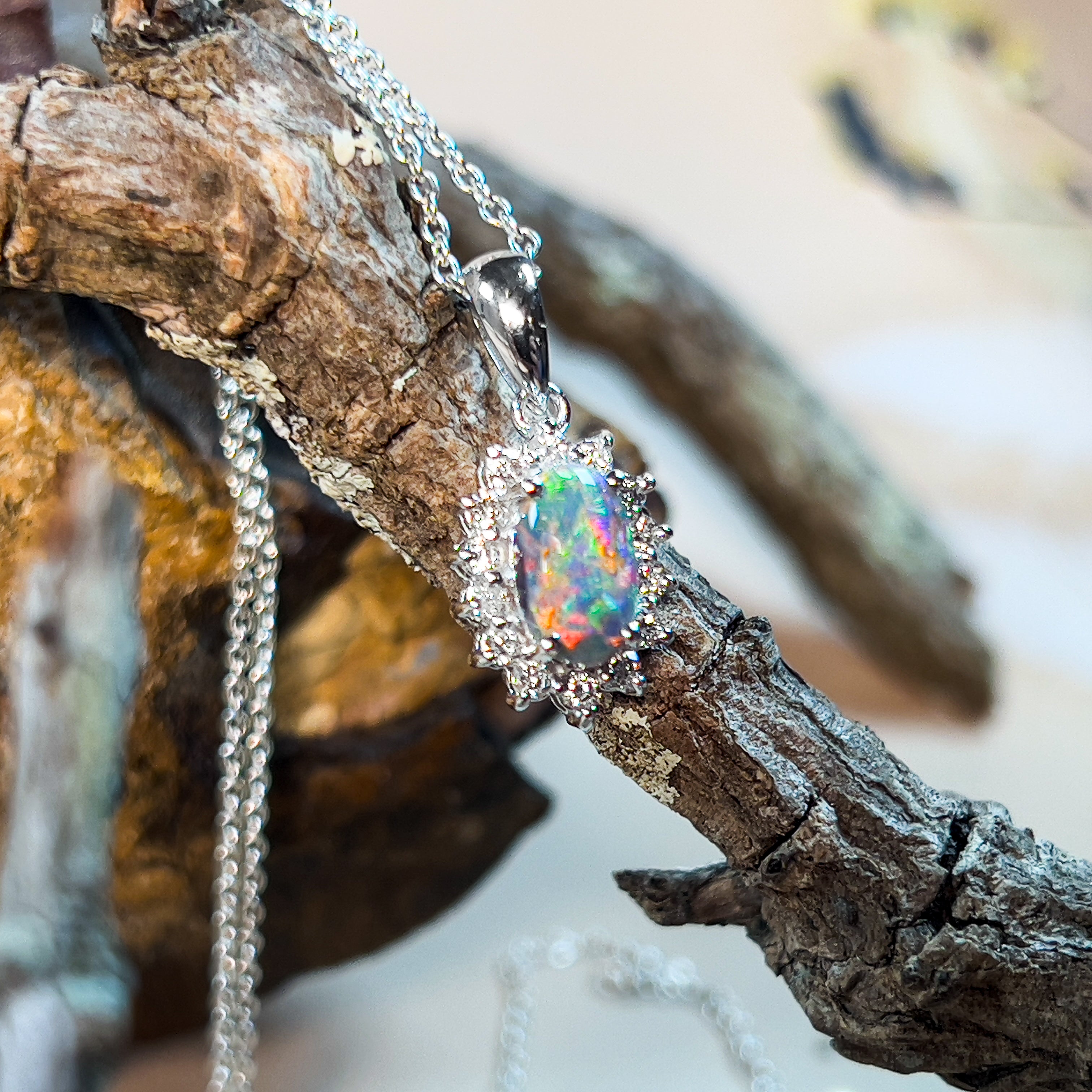 18kt White Gold cluster pendant Black Opal 0.88ct and Diamonds - Masterpiece Jewellery Opal & Gems Sydney Australia | Online Shop