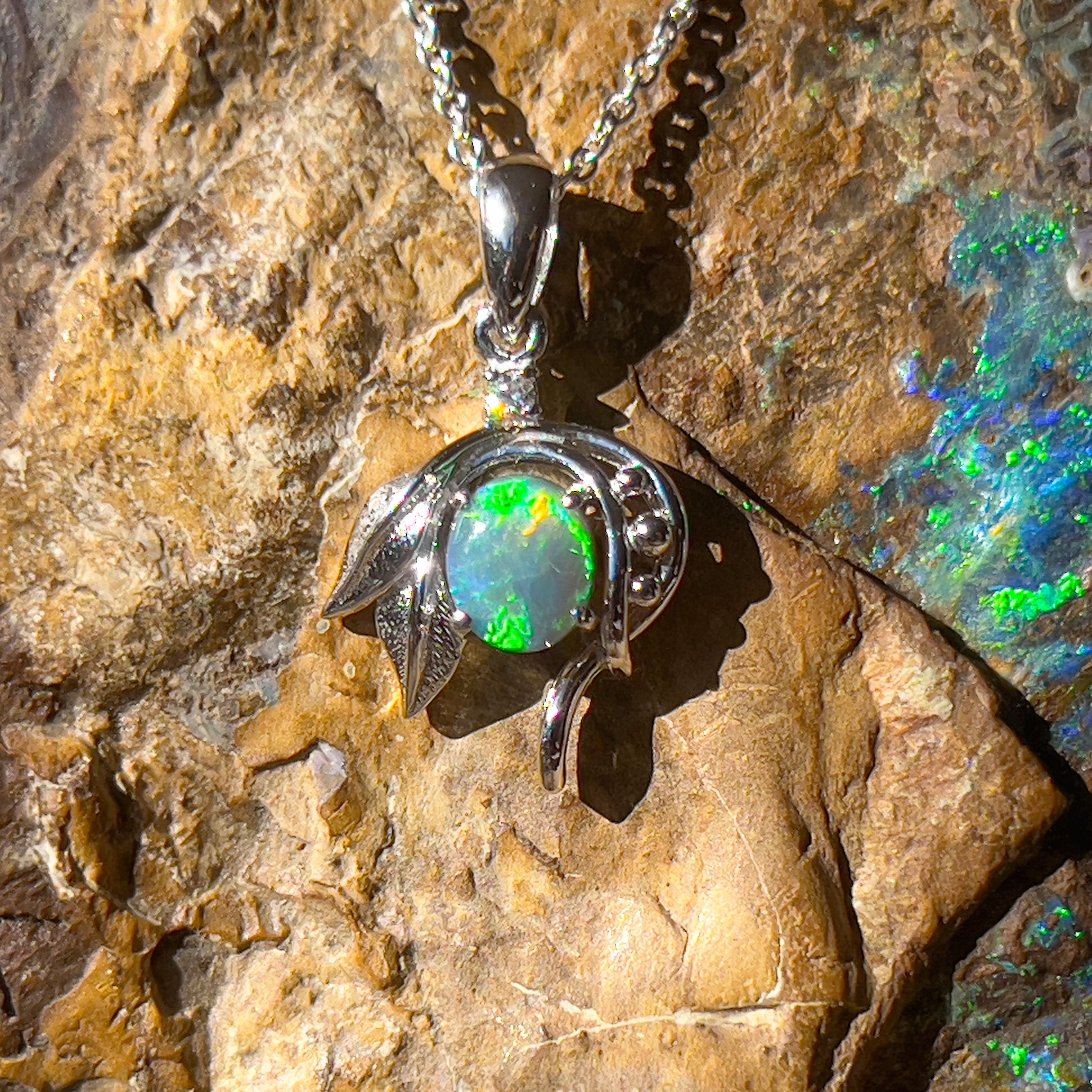 White gold store leaf necklace