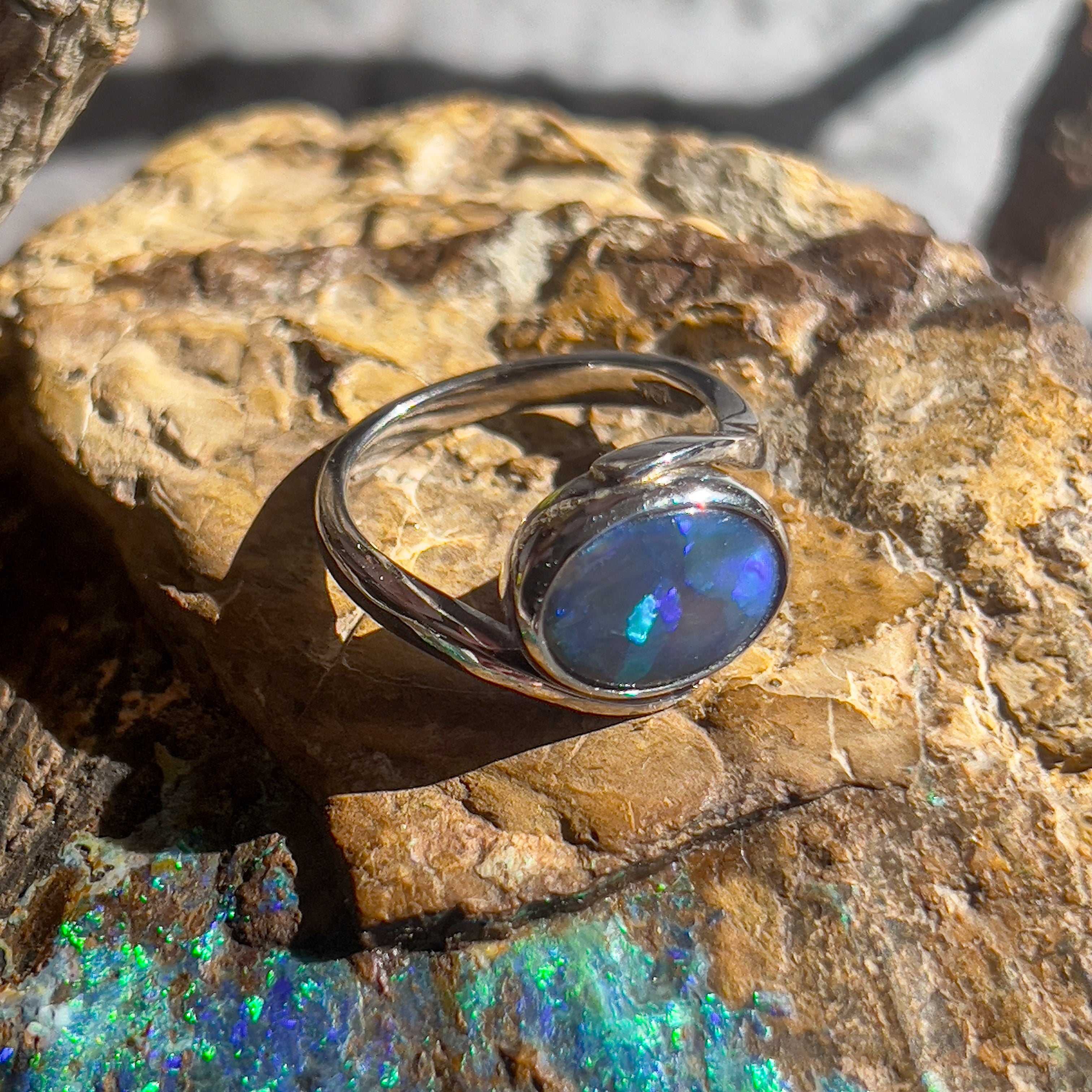 18kt White Gold cross over Black Opal 1.5ct Blue Green solitaire ring - Masterpiece Jewellery Opal & Gems Sydney Australia | Online Shop