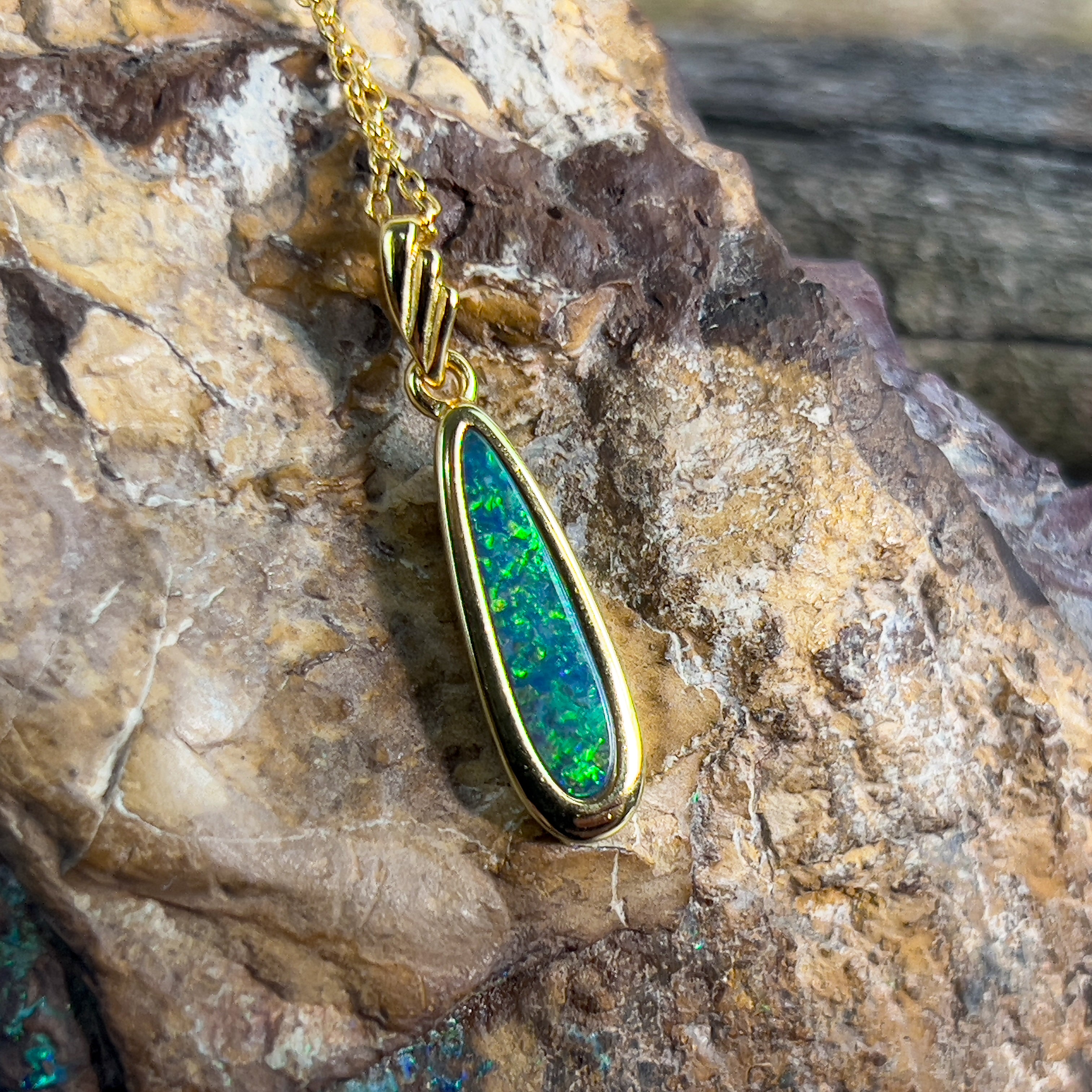 Yellow Gold plated silver opal doublet 27x6.2mm pendant - Masterpiece Jewellery Opal & Gems Sydney Australia | Online Shop